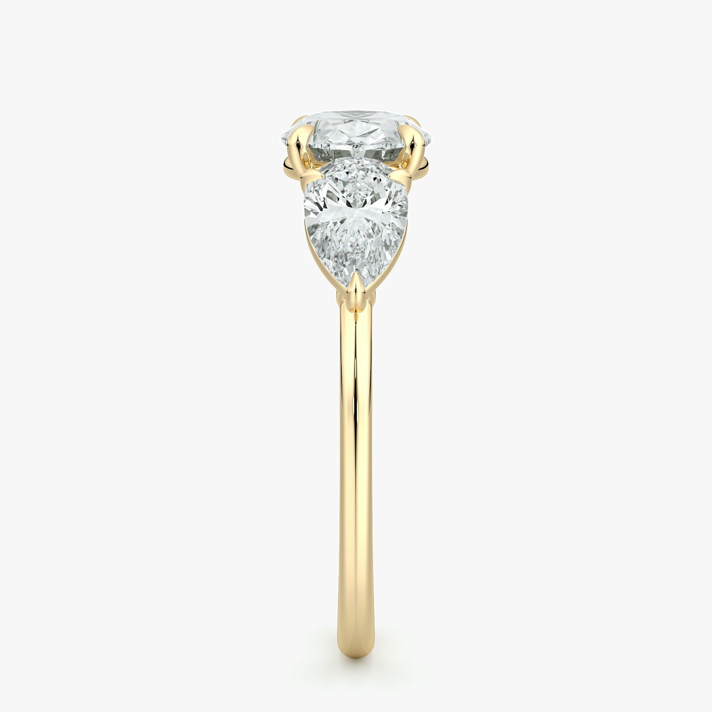 The Three Stone | Oval | 18k | Yellow Gold | bandAccent: Plain | diamondOrientation: horizontal | sideStoneCarat: 0.50ct | sideStoneShape: Pear | caratWeight: other