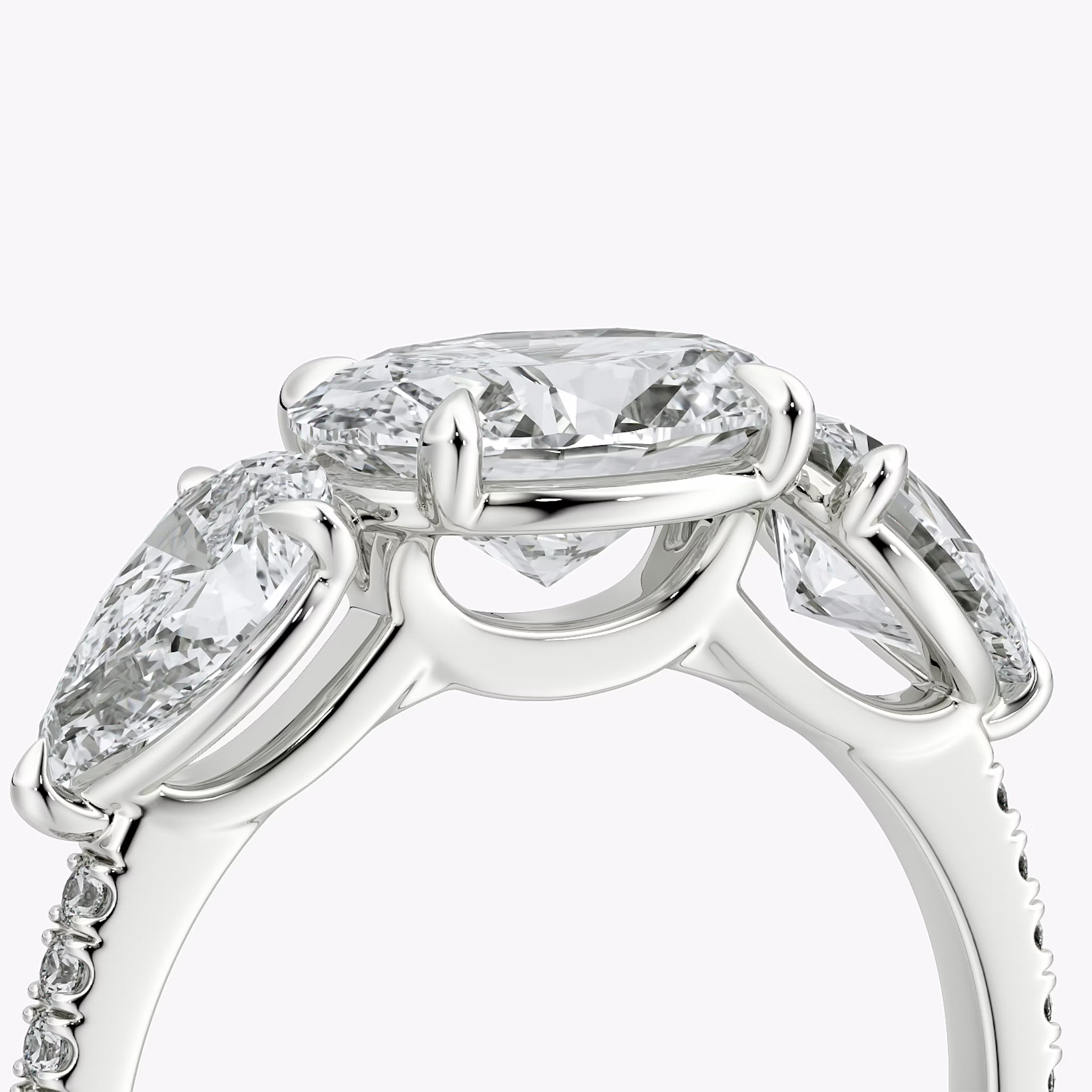 The Three Stone | Oval | 18k | White Gold | bandAccent: Pavé | diamondOrientation: horizontal | sideStoneCarat: 0.50ct | sideStoneShape: Pear | caratWeight: other