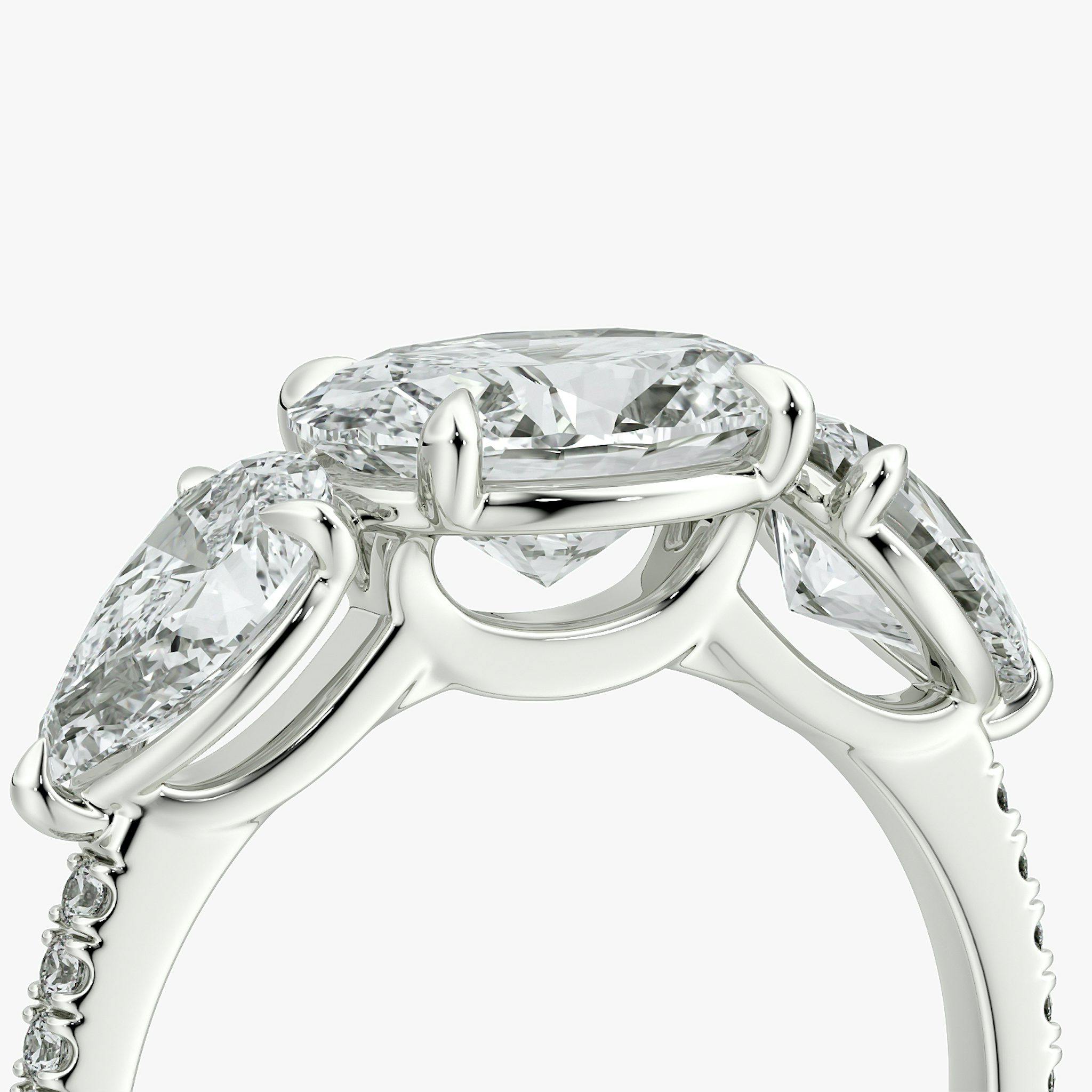 The Three Stone | Oval | 18k | White Gold | bandAccent: Pavé | diamondOrientation: horizontal | sideStoneCarat: 0.50ct | sideStoneShape: Pear | caratWeight: other