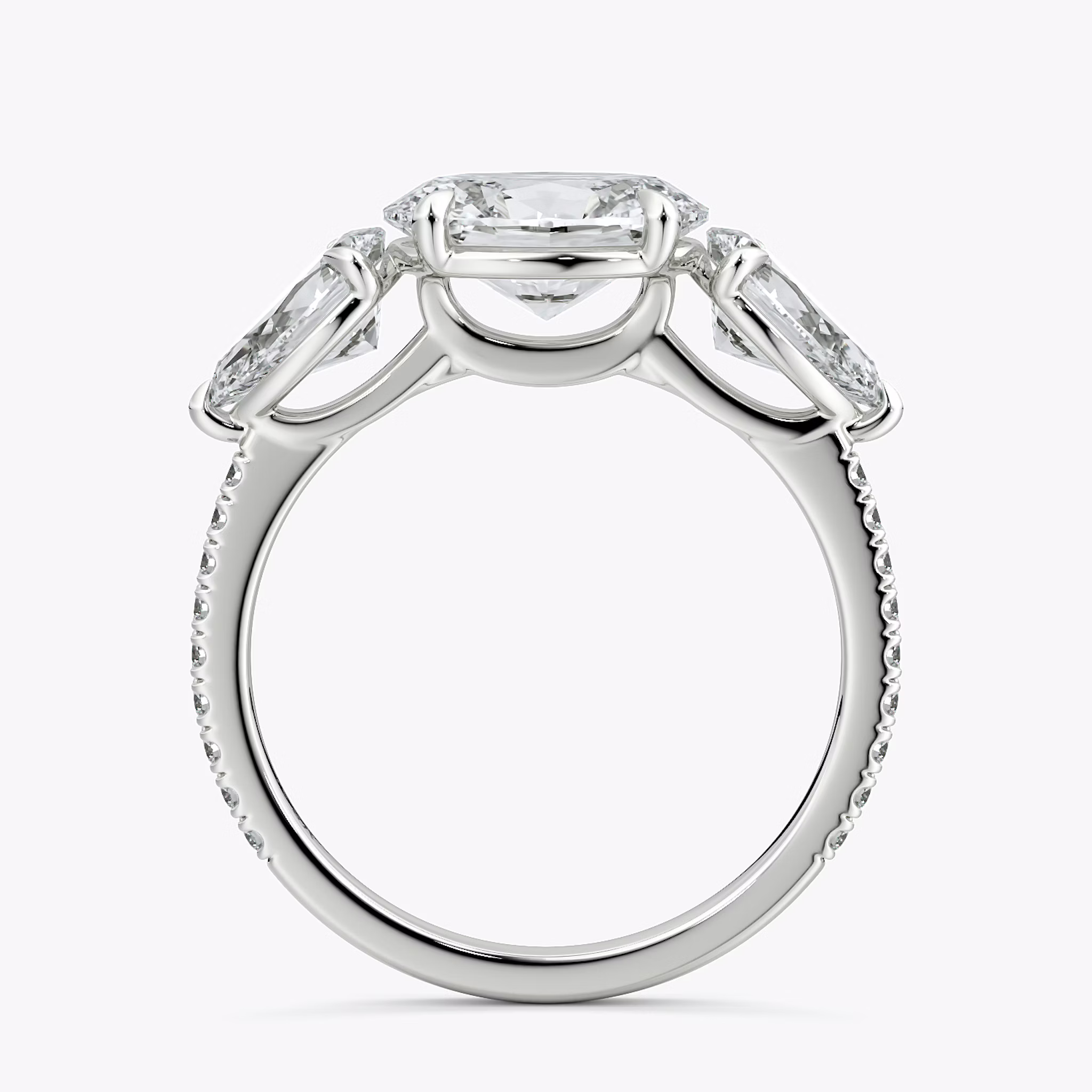 The Three Stone | Oval | 18k | White Gold | bandAccent: Pavé | diamondOrientation: horizontal | sideStoneCarat: 0.50ct | sideStoneShape: Pear | caratWeight: other