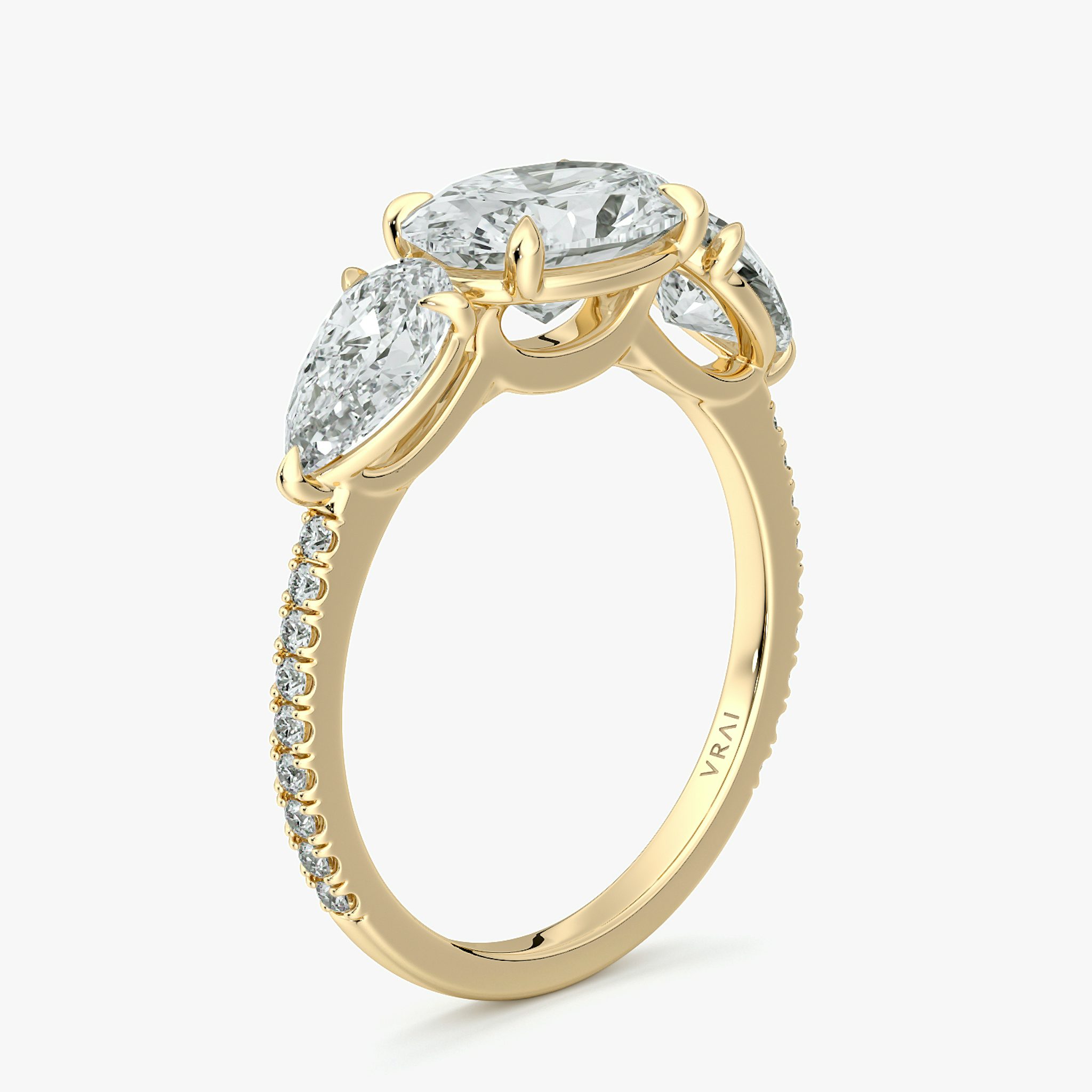 The Three Stone | Oval | 18k | Yellow Gold | bandAccent: Pavé | diamondOrientation: horizontal | sideStoneCarat: 0.50ct | sideStoneShape: Pear | caratWeight: other