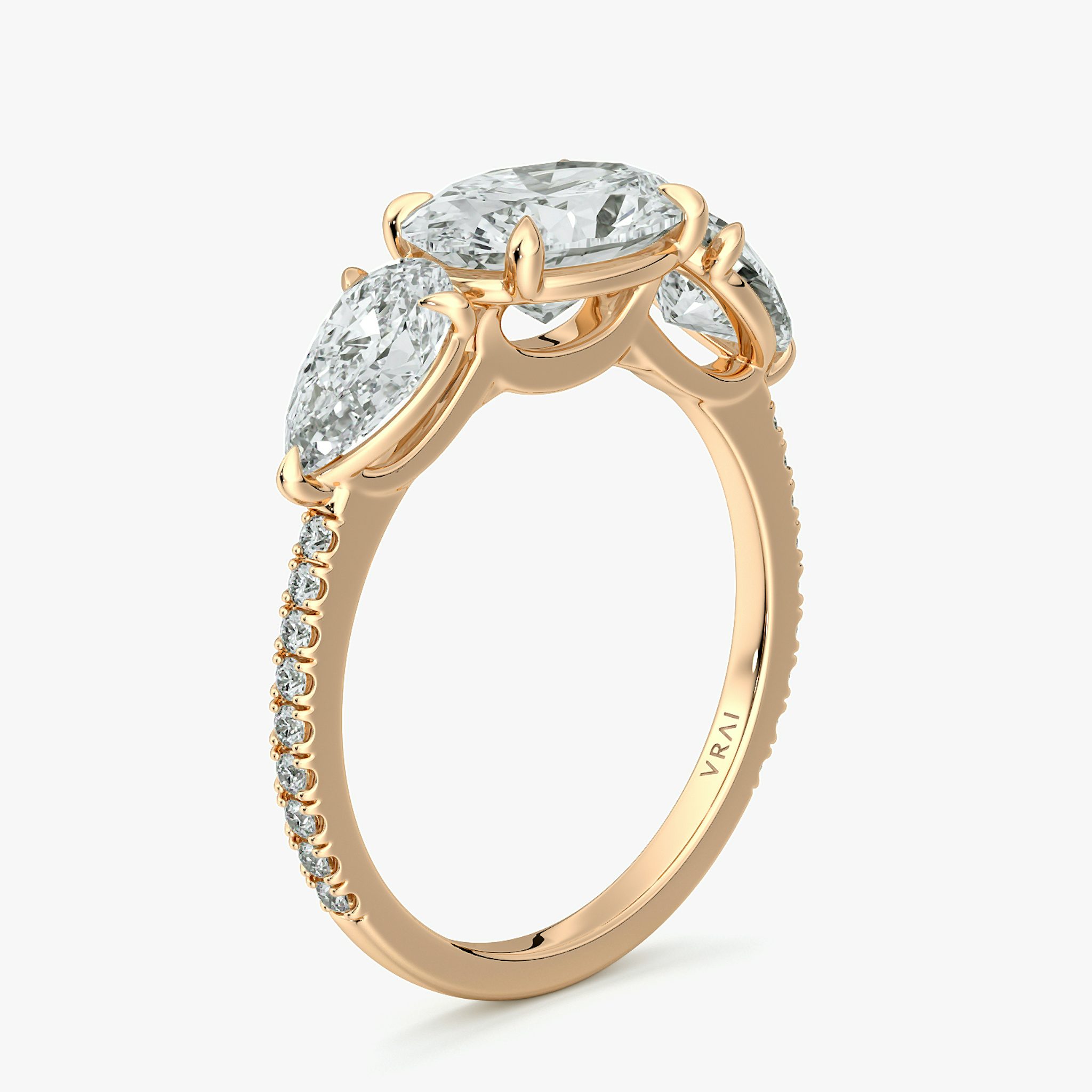 The Three Stone | Oval | 14k | Rose Gold | bandAccent: Pavé | diamondOrientation: horizontal | sideStoneCarat: 0.50ct | sideStoneShape: Pear | caratWeight: other
