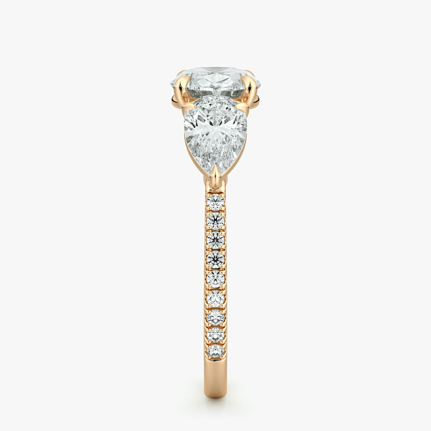 The Three Stone | Oval | 14k | Rose Gold | bandAccent: Pavé | diamondOrientation: horizontal | sideStoneCarat: 0.50ct | sideStoneShape: Pear | caratWeight: other