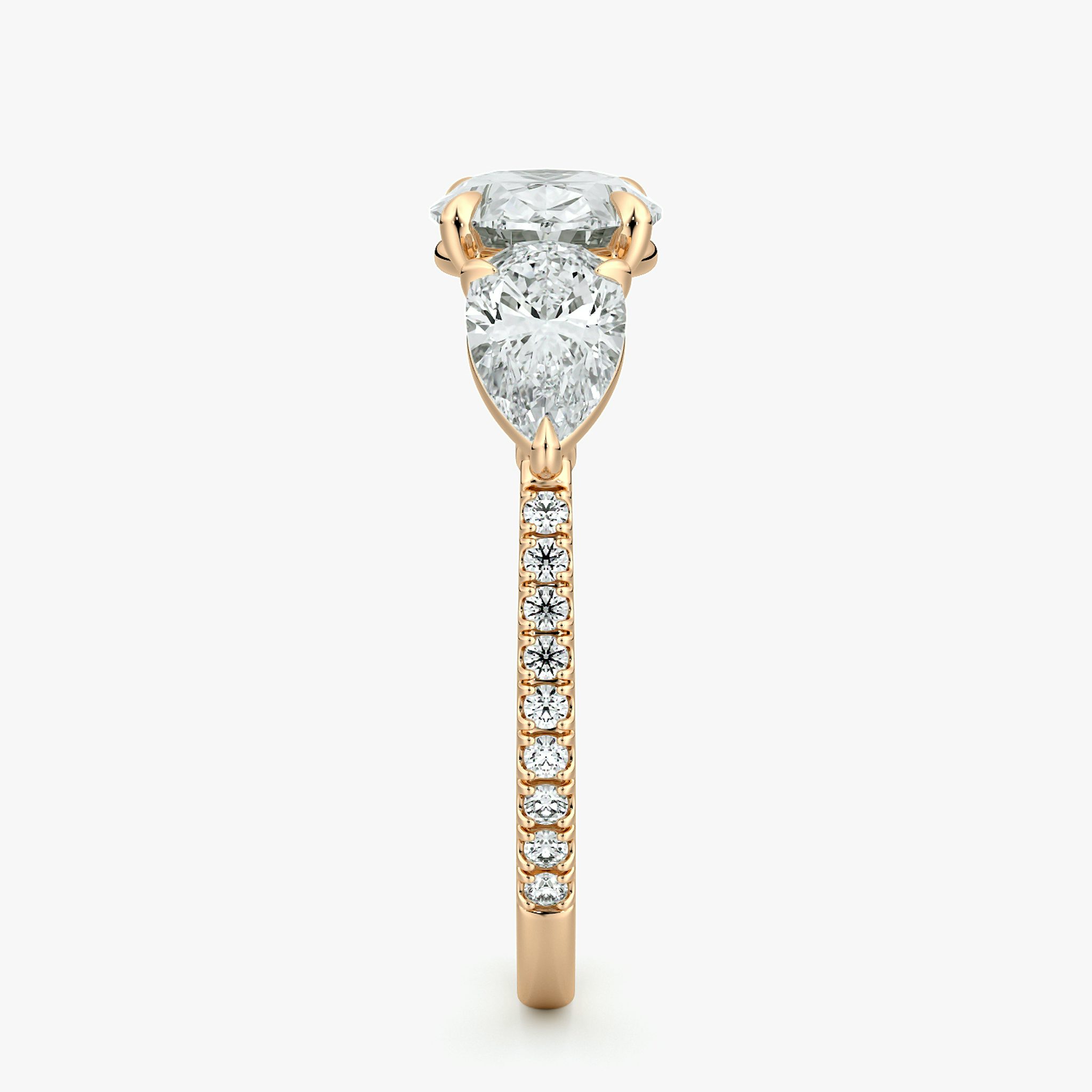 The Three Stone | Oval | 14k | Rose Gold | bandAccent: Pavé | diamondOrientation: horizontal | sideStoneCarat: 0.50ct | sideStoneShape: Pear | caratWeight: other
