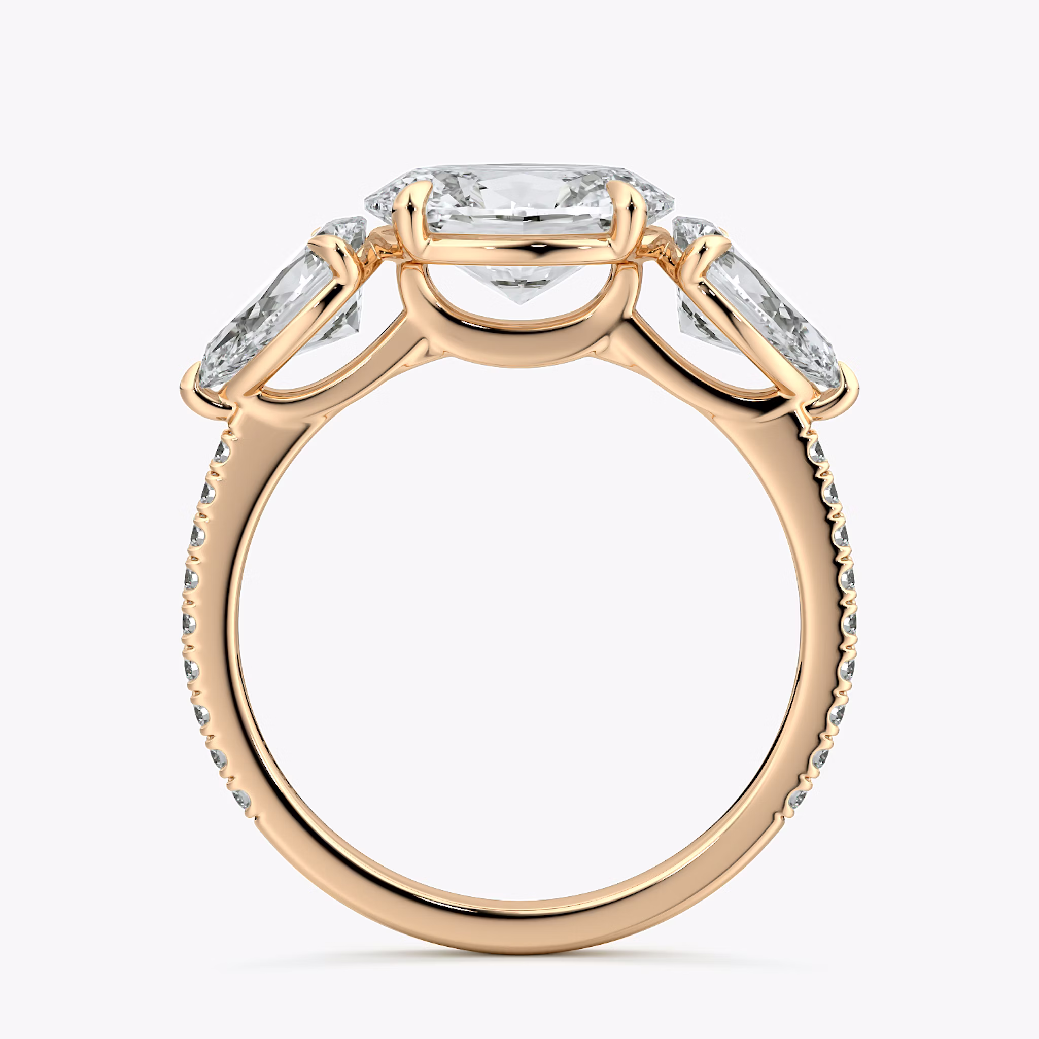 The Three Stone | Oval | 14k | Rose Gold | bandAccent: Pavé | diamondOrientation: horizontal | sideStoneCarat: 0.50ct | sideStoneShape: Pear | caratWeight: other