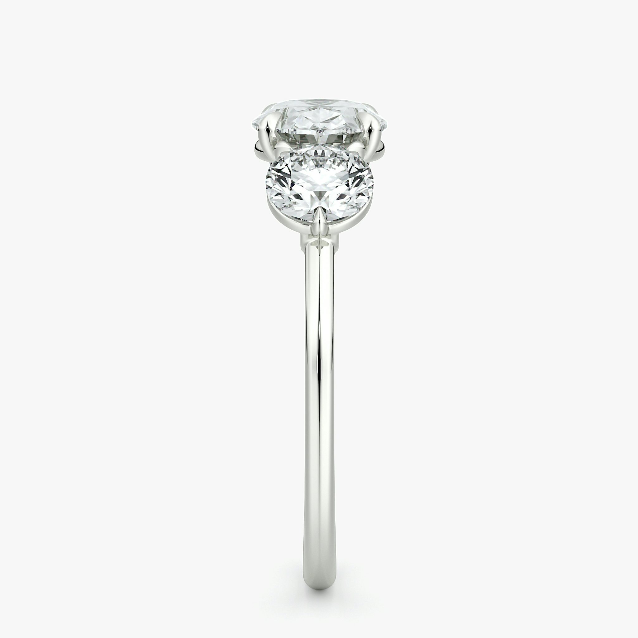 The Three Stone | Oval | 18k | White Gold | bandAccent: Plain | diamondOrientation: horizontal | sideStoneCarat: 0.50ct | sideStoneShape: Round Brilliant | caratWeight: other