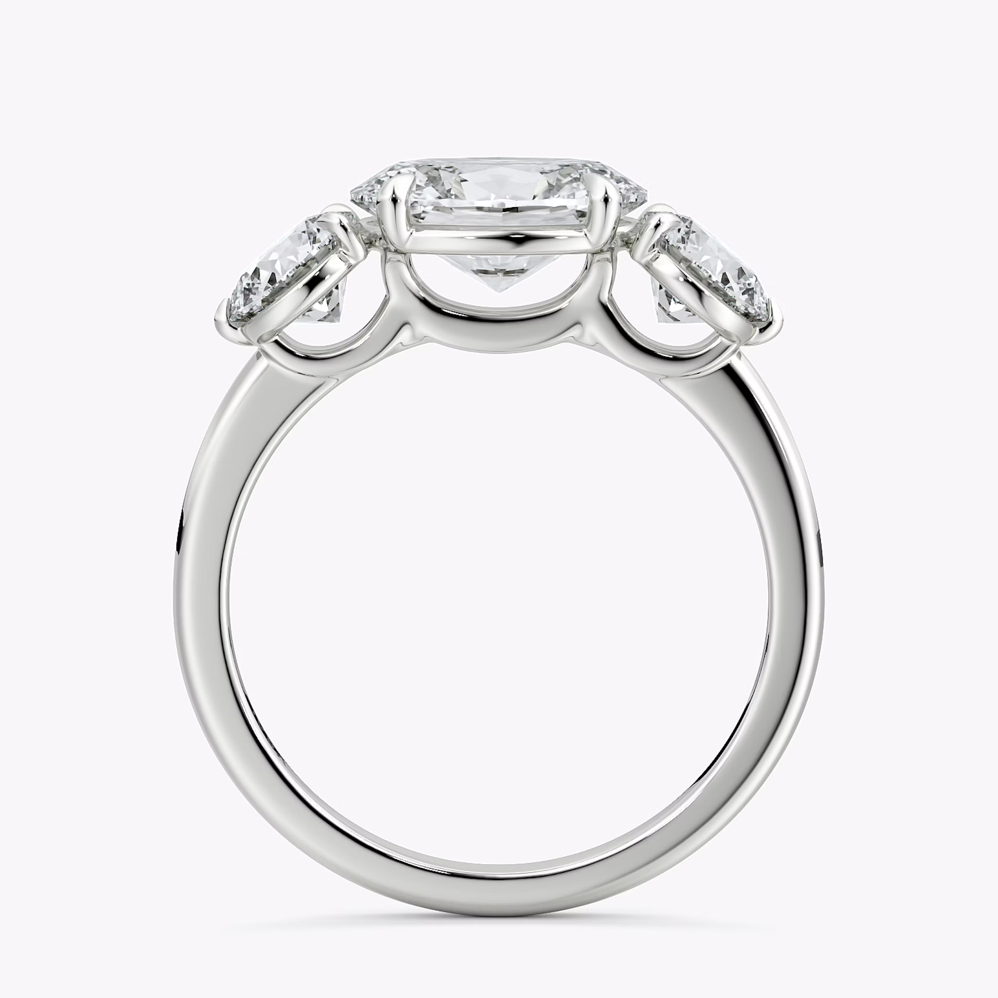 The Three Stone | Oval | 18k | White Gold | bandAccent: Plain | diamondOrientation: horizontal | sideStoneCarat: 0.50ct | sideStoneShape: Round Brilliant | caratWeight: other