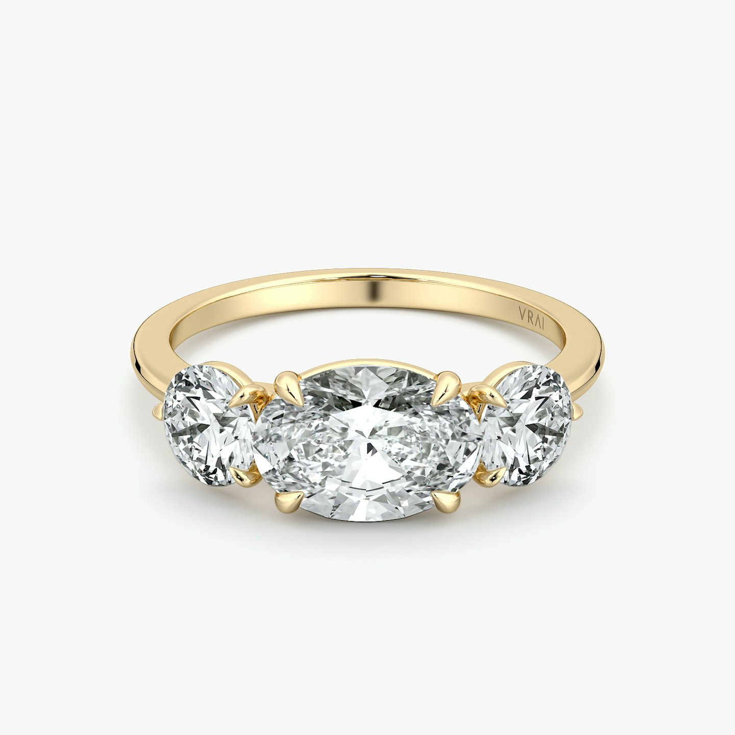 The Three Stone | Oval | 18k | Yellow Gold | bandAccent: Plain | diamondOrientation: horizontal | sideStoneCarat: 0.50ct | sideStoneShape: Round Brilliant | caratWeight: other