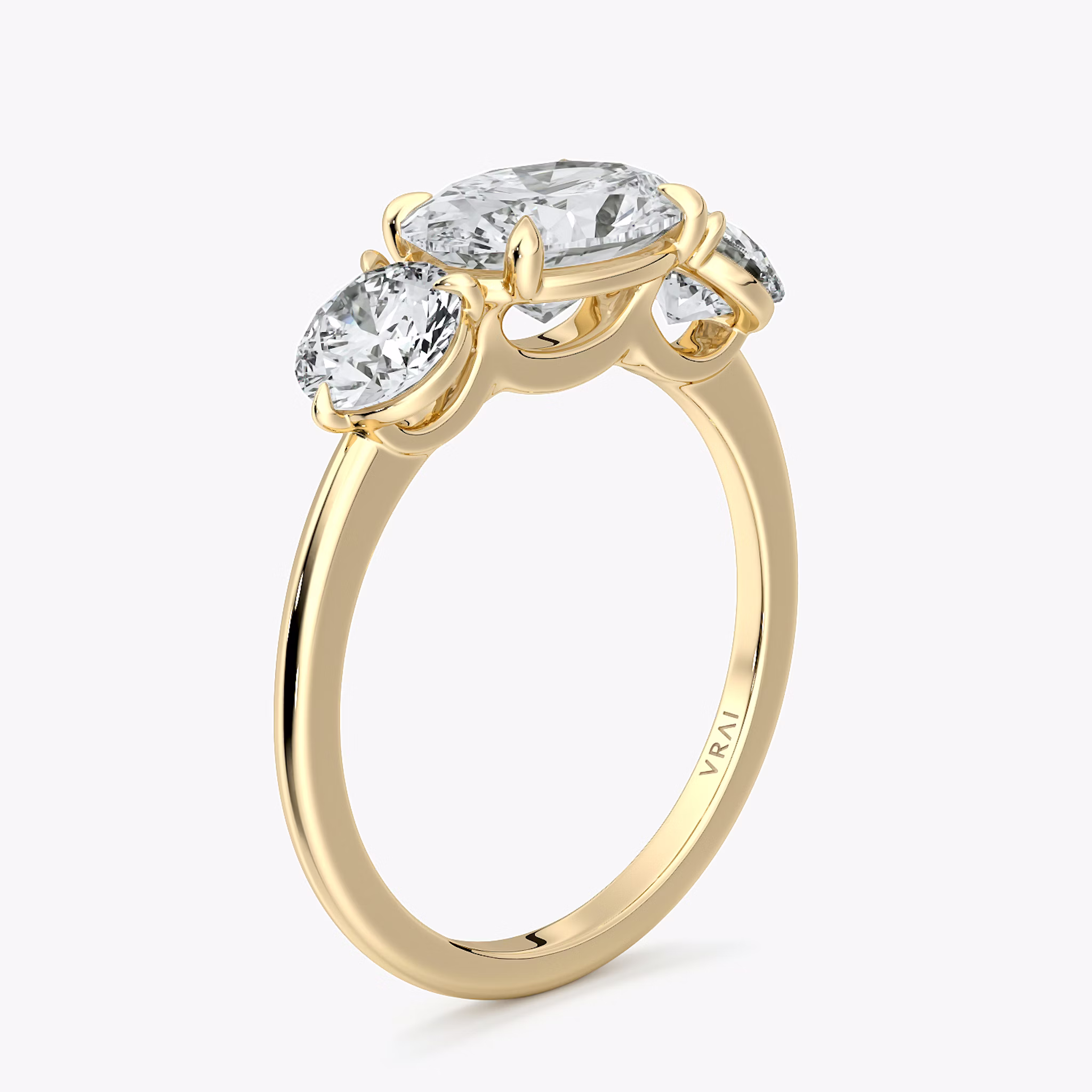 The Three Stone | Oval | 18k | Yellow Gold | bandAccent: Plain | diamondOrientation: horizontal | sideStoneCarat: 0.50ct | sideStoneShape: Round Brilliant | caratWeight: other