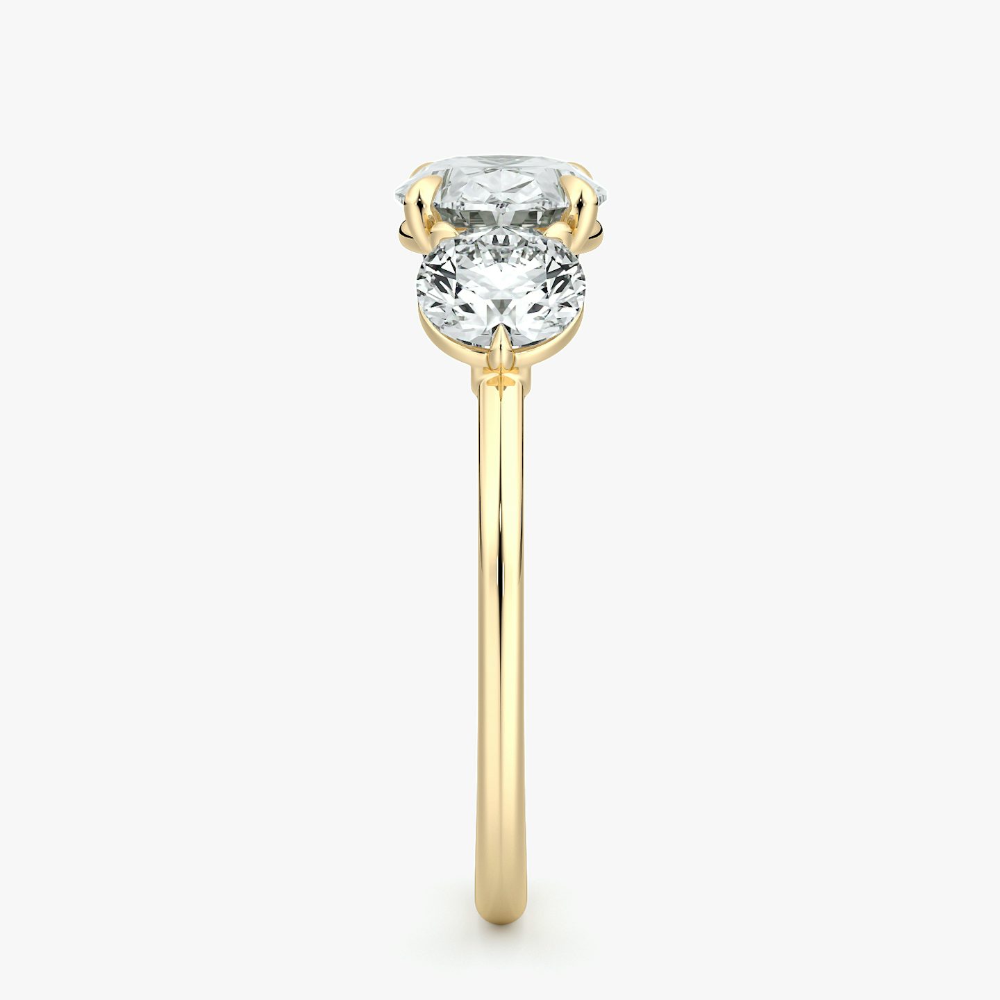 The Three Stone | Oval | 18k | Yellow Gold | bandAccent: Plain | diamondOrientation: horizontal | sideStoneCarat: 0.50ct | sideStoneShape: Round Brilliant | caratWeight: other
