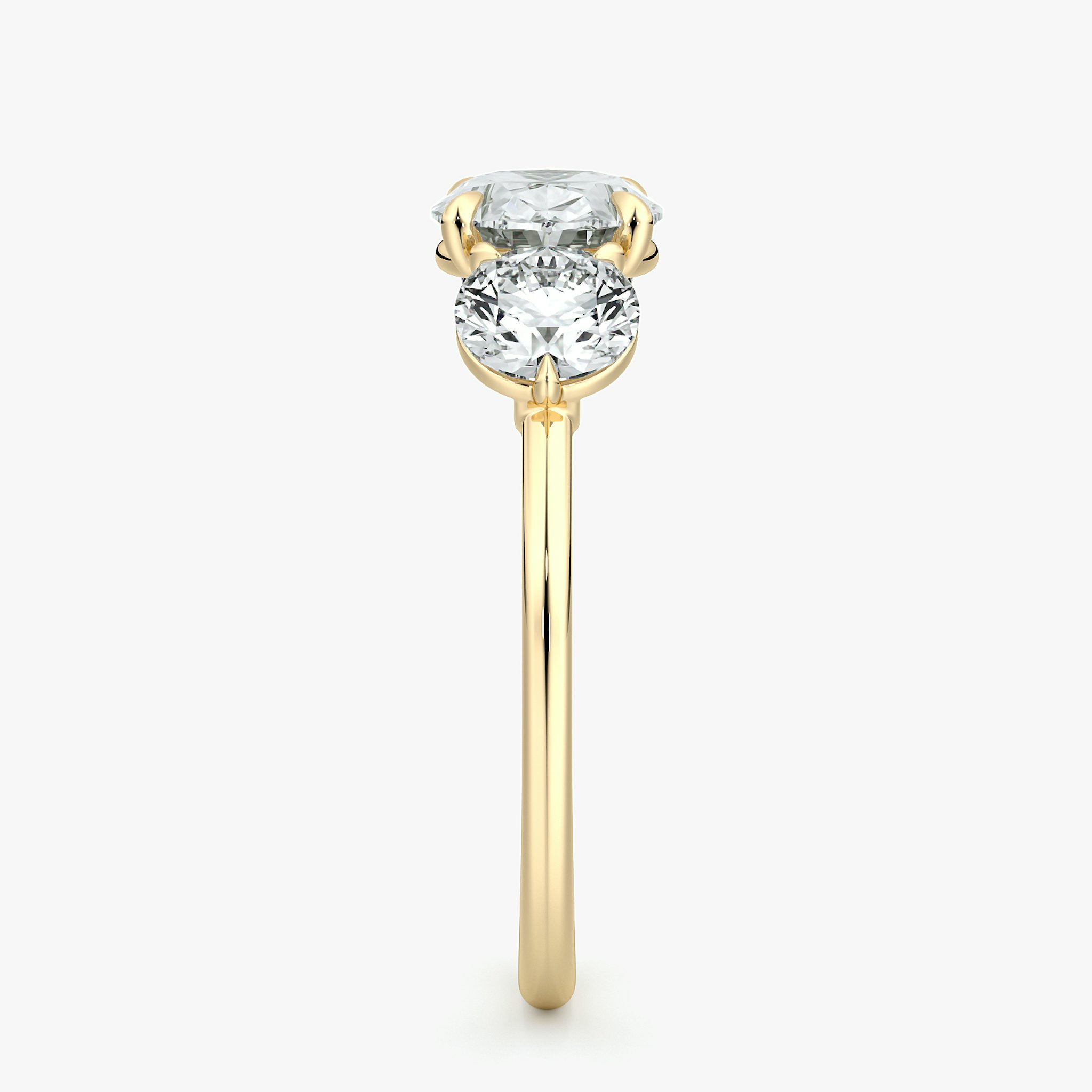 The Three Stone | Oval | 18k | Yellow Gold | bandAccent: Plain | diamondOrientation: horizontal | sideStoneCarat: 0.50ct | sideStoneShape: Round Brilliant | caratWeight: other