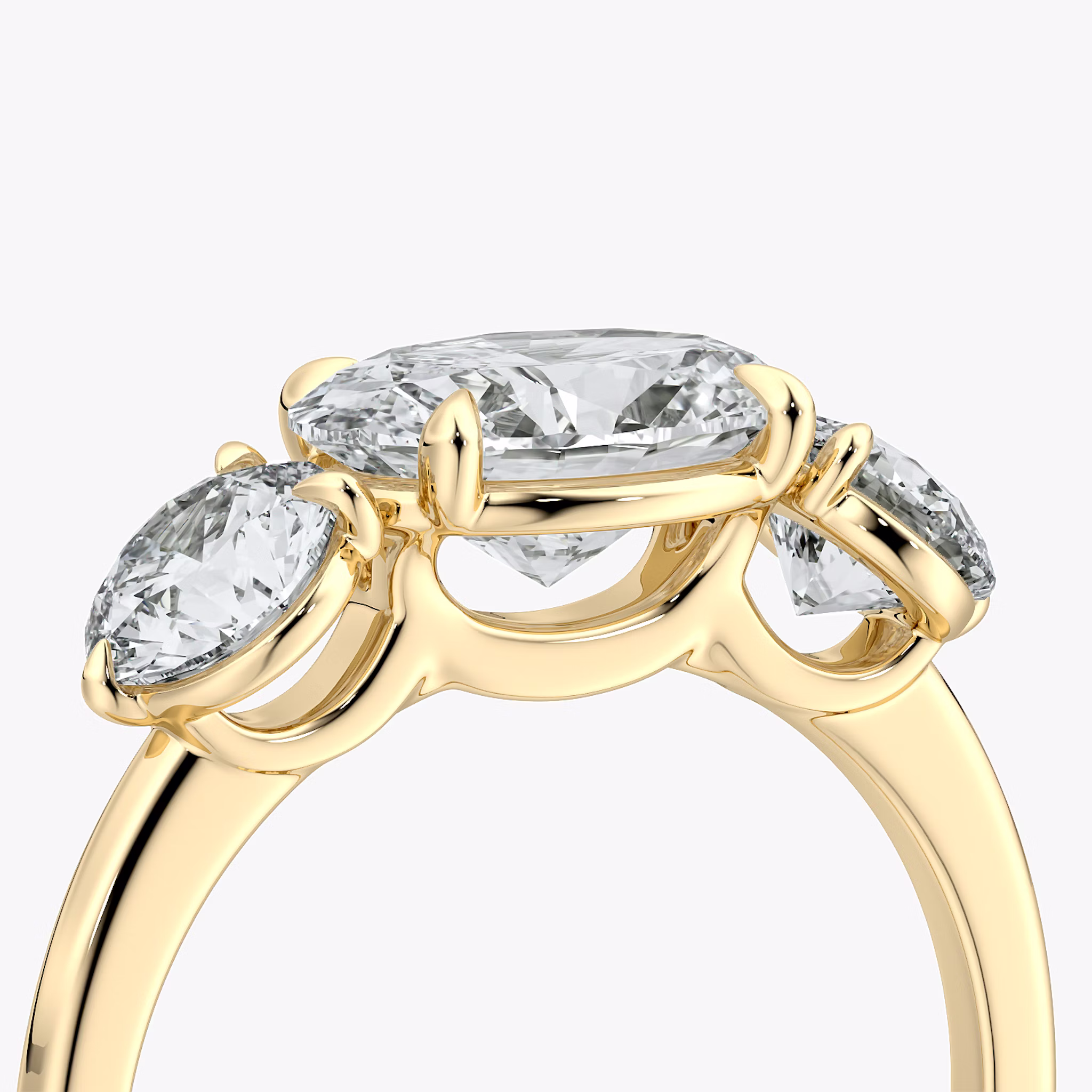 The Three Stone | Oval | 18k | Yellow Gold | bandAccent: Plain | diamondOrientation: horizontal | sideStoneCarat: 0.50ct | sideStoneShape: Round Brilliant | caratWeight: other