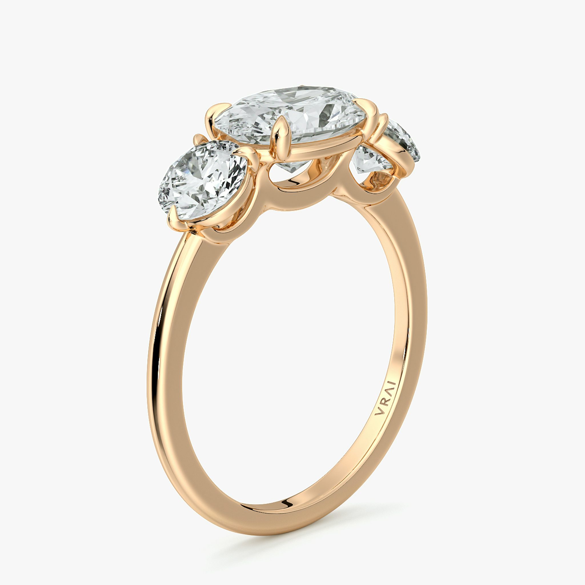 The Three Stone | Oval | 14k | Rose Gold | bandAccent: Plain | diamondOrientation: horizontal | sideStoneCarat: 0.50ct | sideStoneShape: Round Brilliant | caratWeight: other