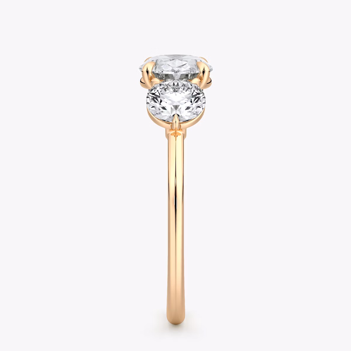 The Three Stone | Oval | 14k | Rose Gold | bandAccent: Plain | diamondOrientation: horizontal | sideStoneCarat: 0.50ct | sideStoneShape: Round Brilliant | caratWeight: other