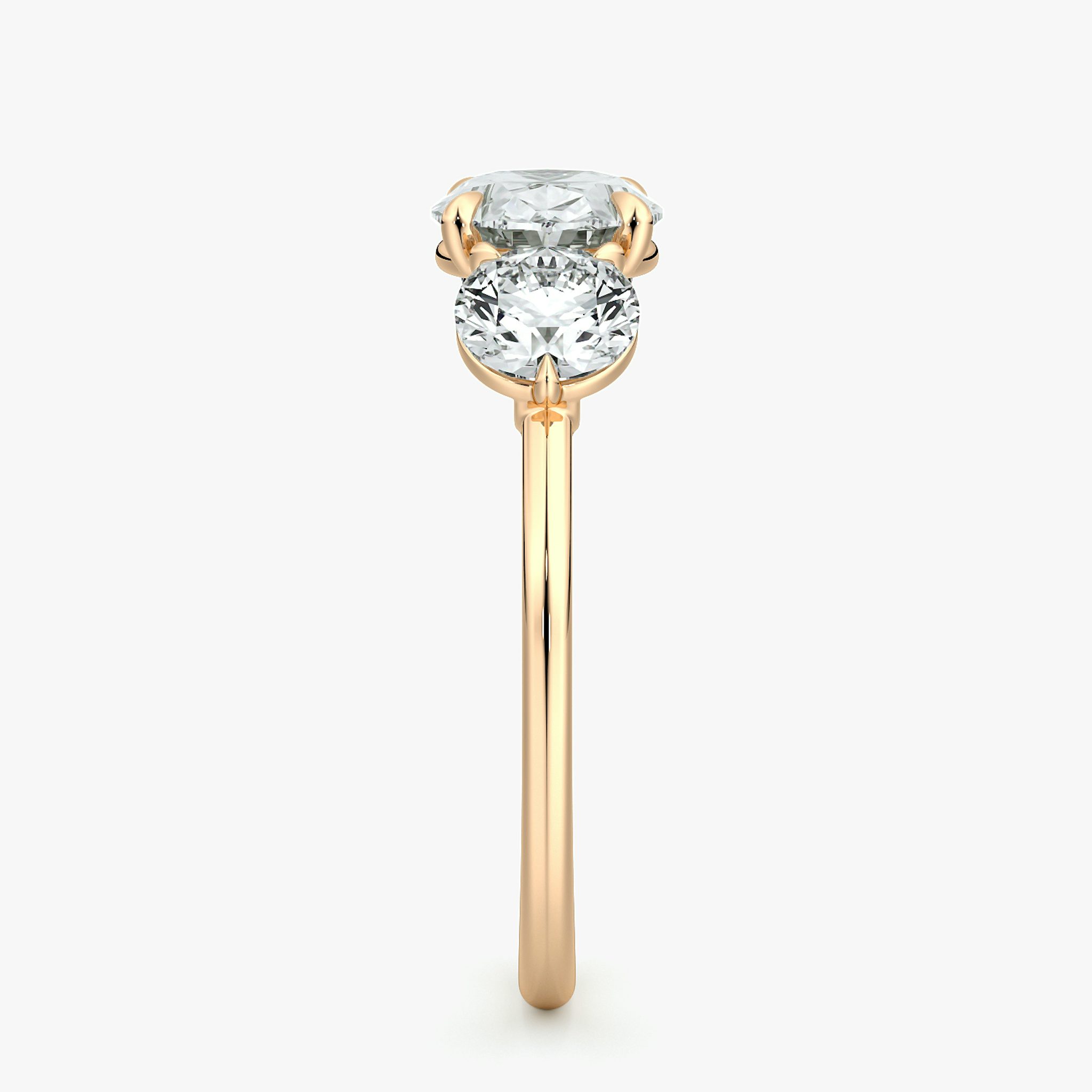 The Three Stone | Oval | 14k | Rose Gold | bandAccent: Plain | diamondOrientation: horizontal | sideStoneCarat: 0.50ct | sideStoneShape: Round Brilliant | caratWeight: other