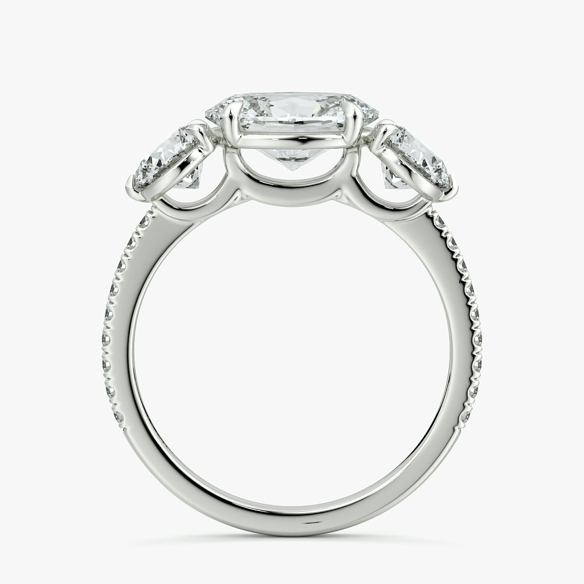 The Three Stone | Oval | 18k | White Gold | bandAccent: Pavé | diamondOrientation: horizontal | sideStoneCarat: 0.50ct | sideStoneShape: Round Brilliant | caratWeight: other