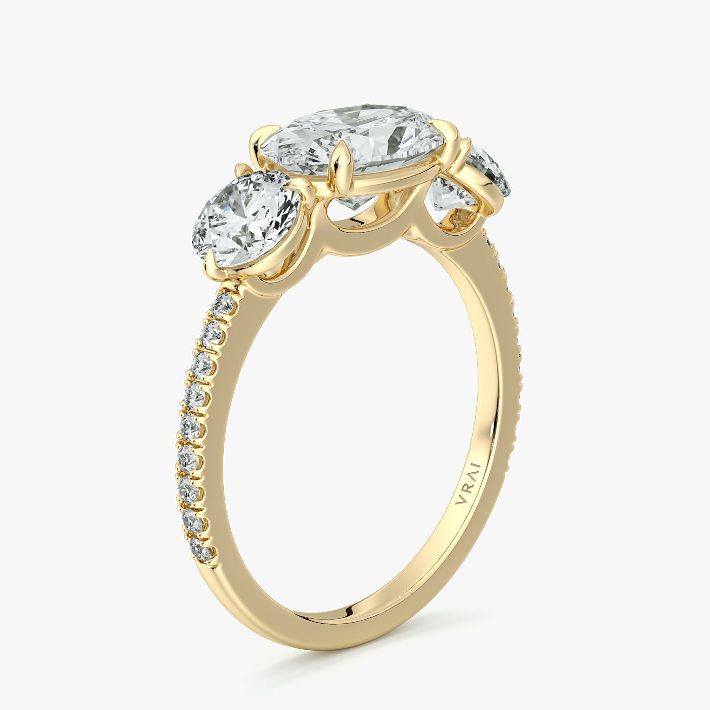 The Three Stone | Oval | 18k | Yellow Gold | bandAccent: Pavé | diamondOrientation: horizontal | sideStoneCarat: 0.50ct | sideStoneShape: Round Brilliant | caratWeight: other