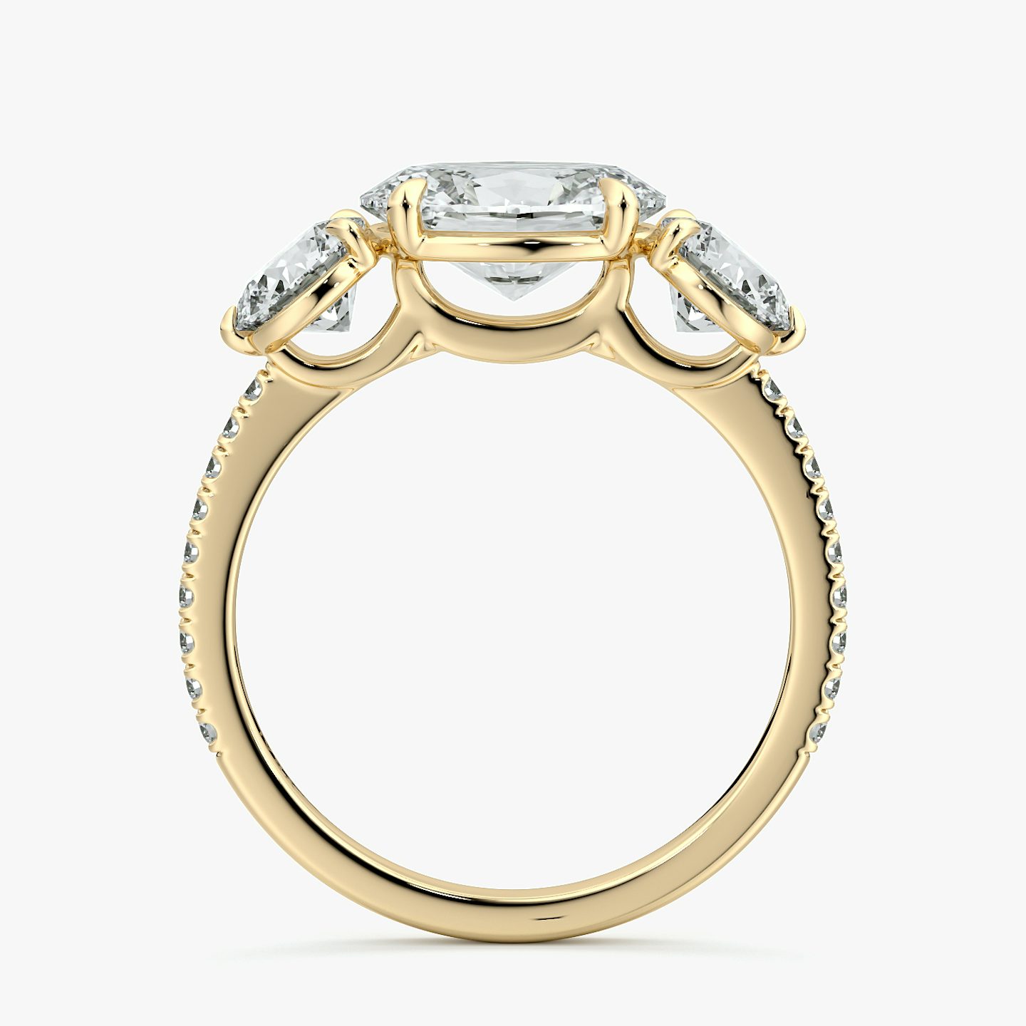 The Three Stone | Oval | 18k | Yellow Gold | bandAccent: Pavé | diamondOrientation: horizontal | sideStoneCarat: 0.50ct | sideStoneShape: Round Brilliant | caratWeight: other