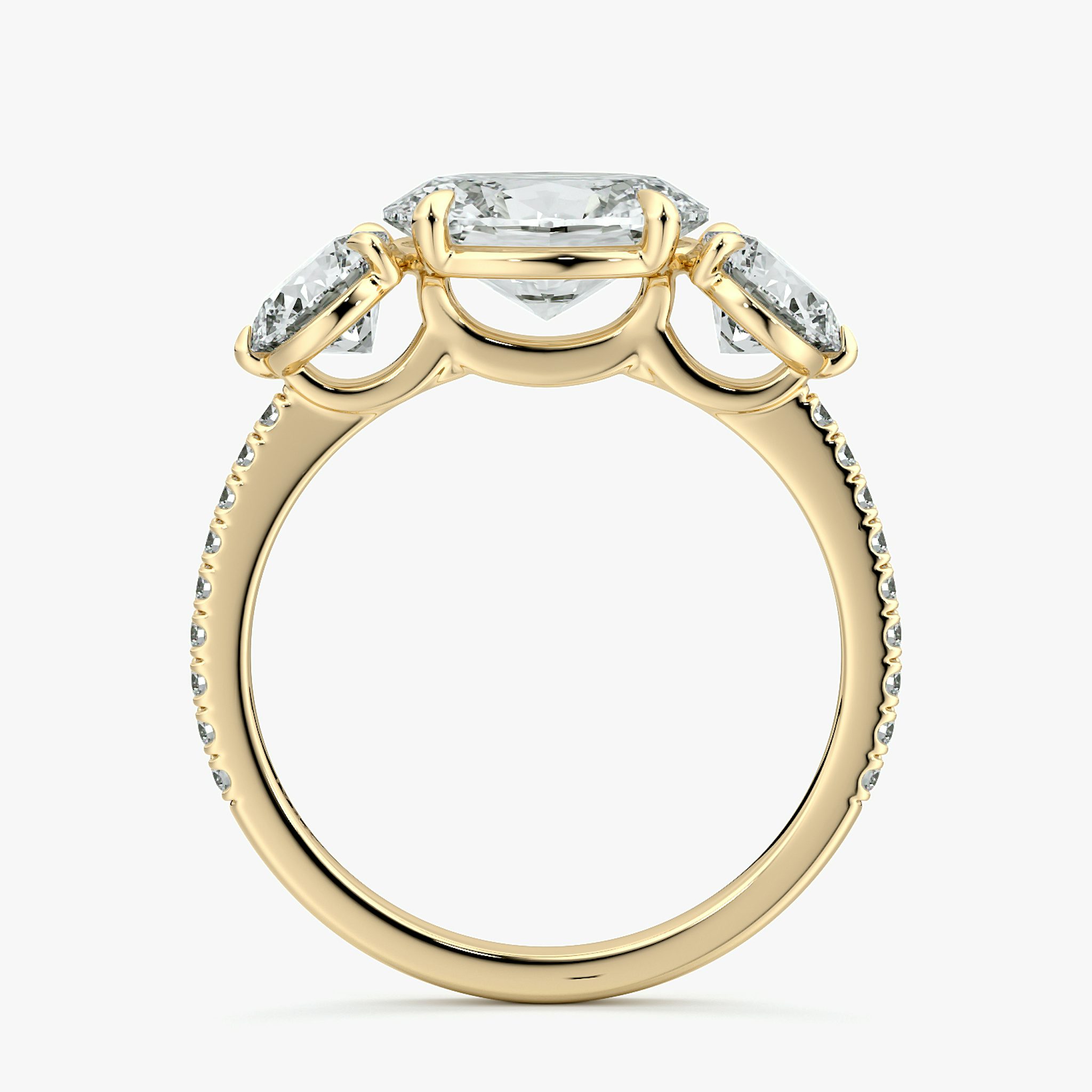 The Three Stone | Oval | 18k | Yellow Gold | bandAccent: Pavé | diamondOrientation: horizontal | sideStoneCarat: 0.50ct | sideStoneShape: Round Brilliant | caratWeight: other