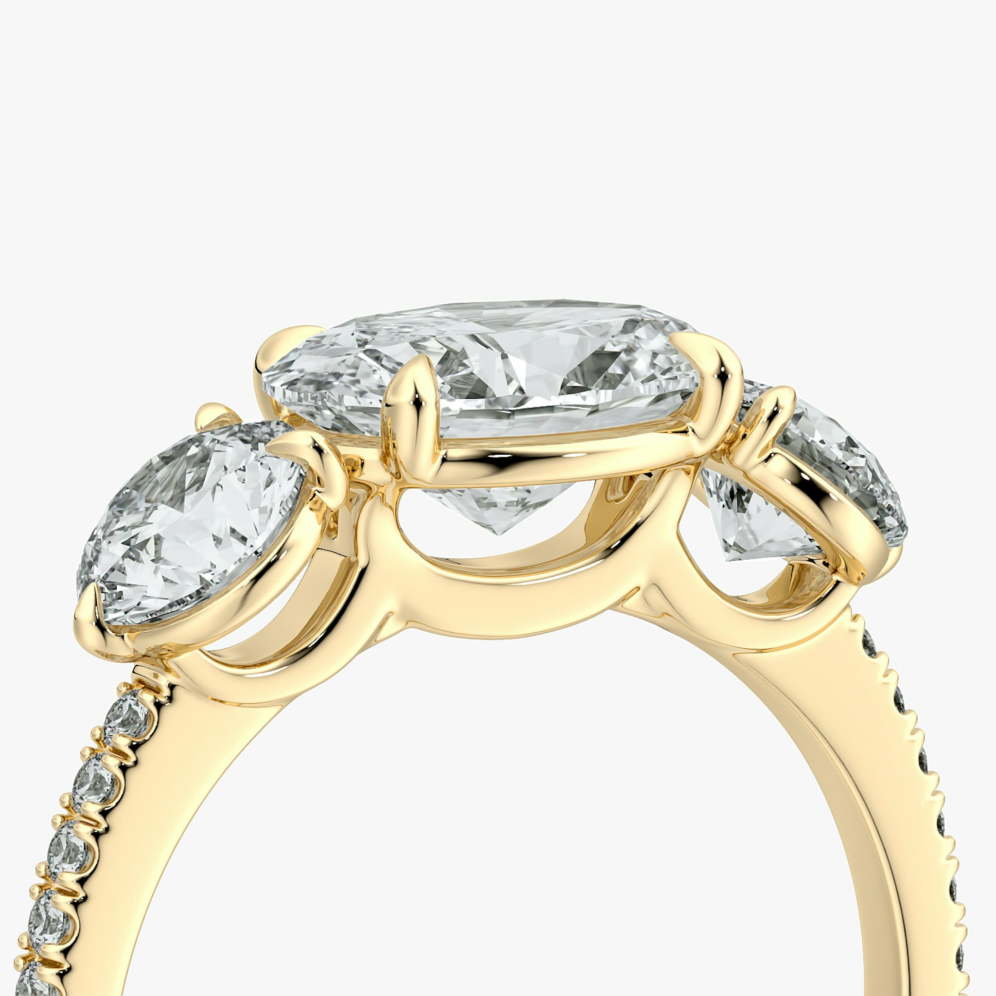 The Three Stone | Oval | 18k | Yellow Gold | bandAccent: Pavé | diamondOrientation: horizontal | sideStoneCarat: 0.50ct | sideStoneShape: Round Brilliant | caratWeight: other