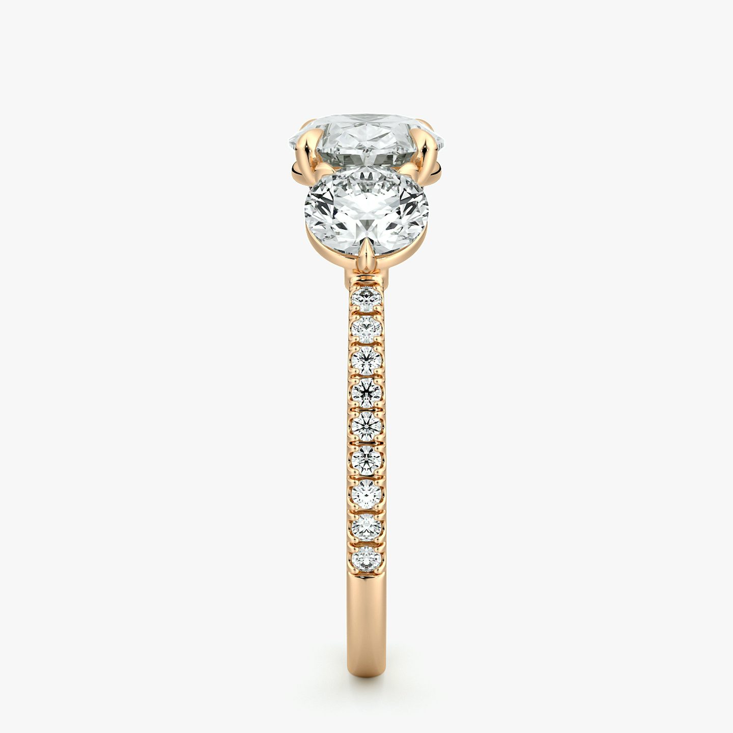 The Three Stone | Oval | 14k | Rose Gold | bandAccent: Pavé | diamondOrientation: horizontal | sideStoneCarat: 0.50ct | sideStoneShape: Round Brilliant | caratWeight: other