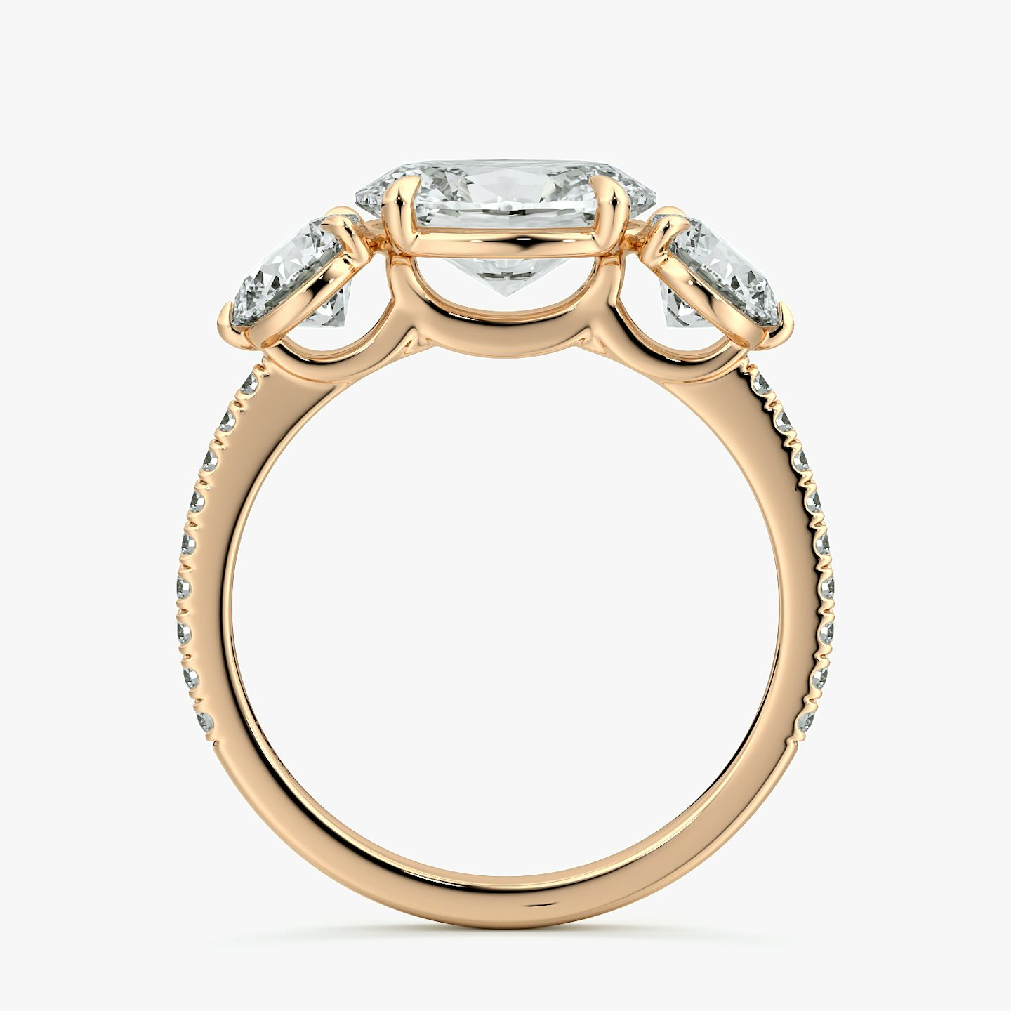 The Three Stone | Oval | 14k | Rose Gold | bandAccent: Pavé | diamondOrientation: horizontal | sideStoneCarat: 0.50ct | sideStoneShape: Round Brilliant | caratWeight: other