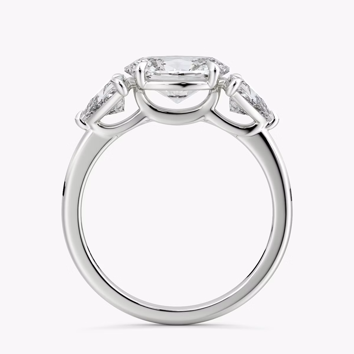 The Three Stone | Oval | 18k | White Gold | bandAccent: Plain | diamondOrientation: horizontal | sideStoneCarat: 0.50ct | sideStoneShape: Trillion | caratWeight: other