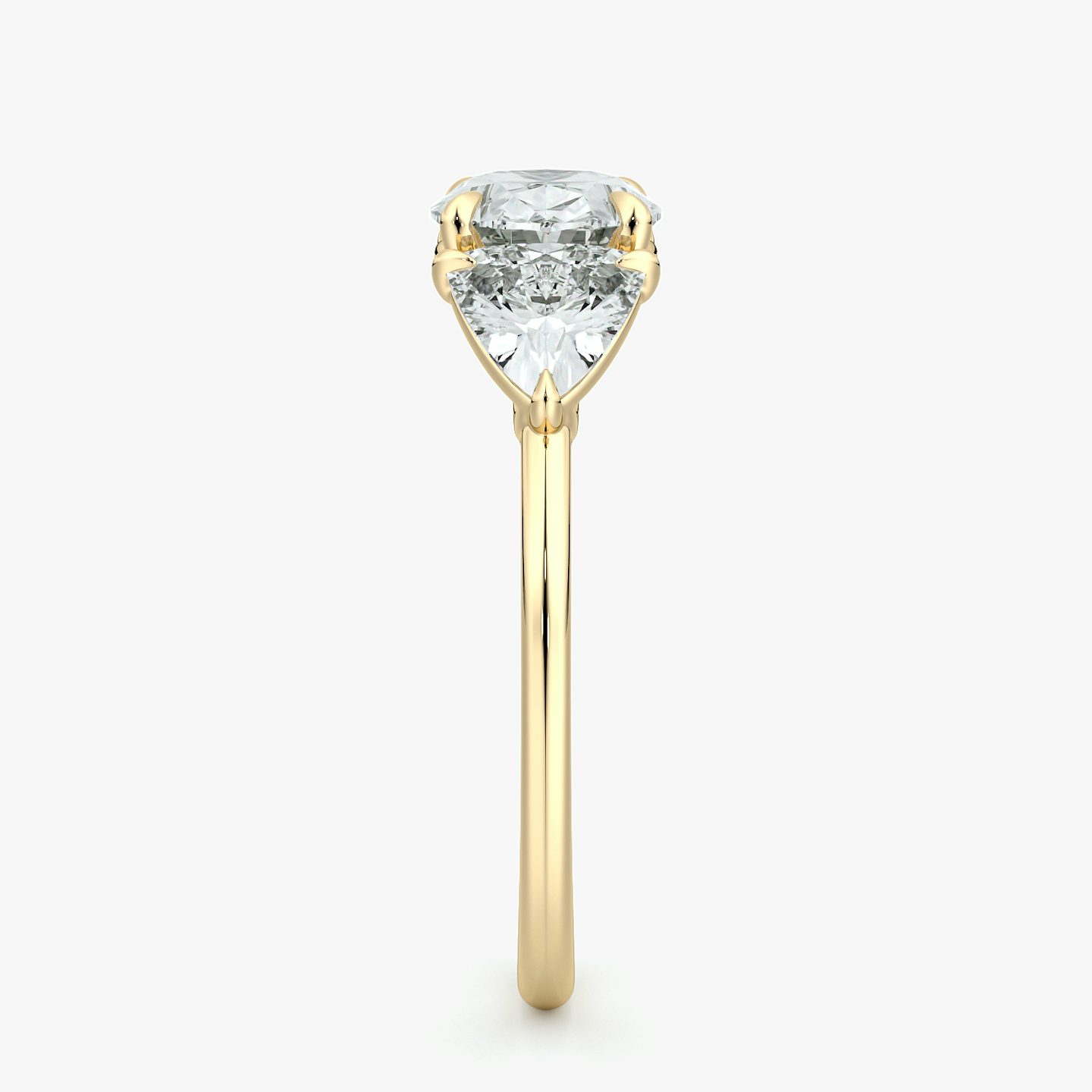 The Three Stone | Oval | 18k | Yellow Gold | bandAccent: Plain | diamondOrientation: horizontal | sideStoneCarat: 0.50ct | sideStoneShape: Trillion | caratWeight: other
