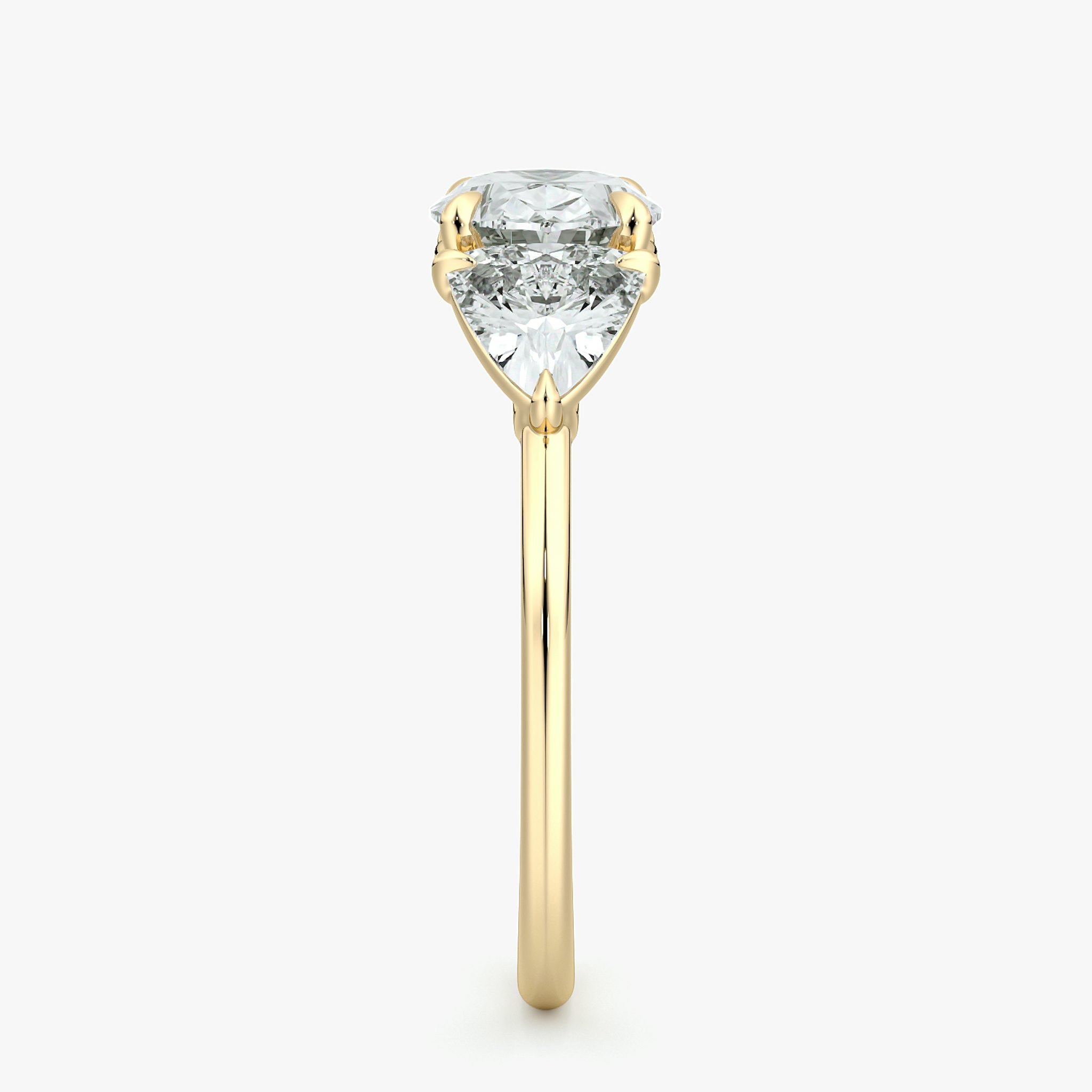 The Three Stone | Oval | 18k | Yellow Gold | bandAccent: Plain | diamondOrientation: horizontal | sideStoneCarat: 0.50ct | sideStoneShape: Trillion | caratWeight: other