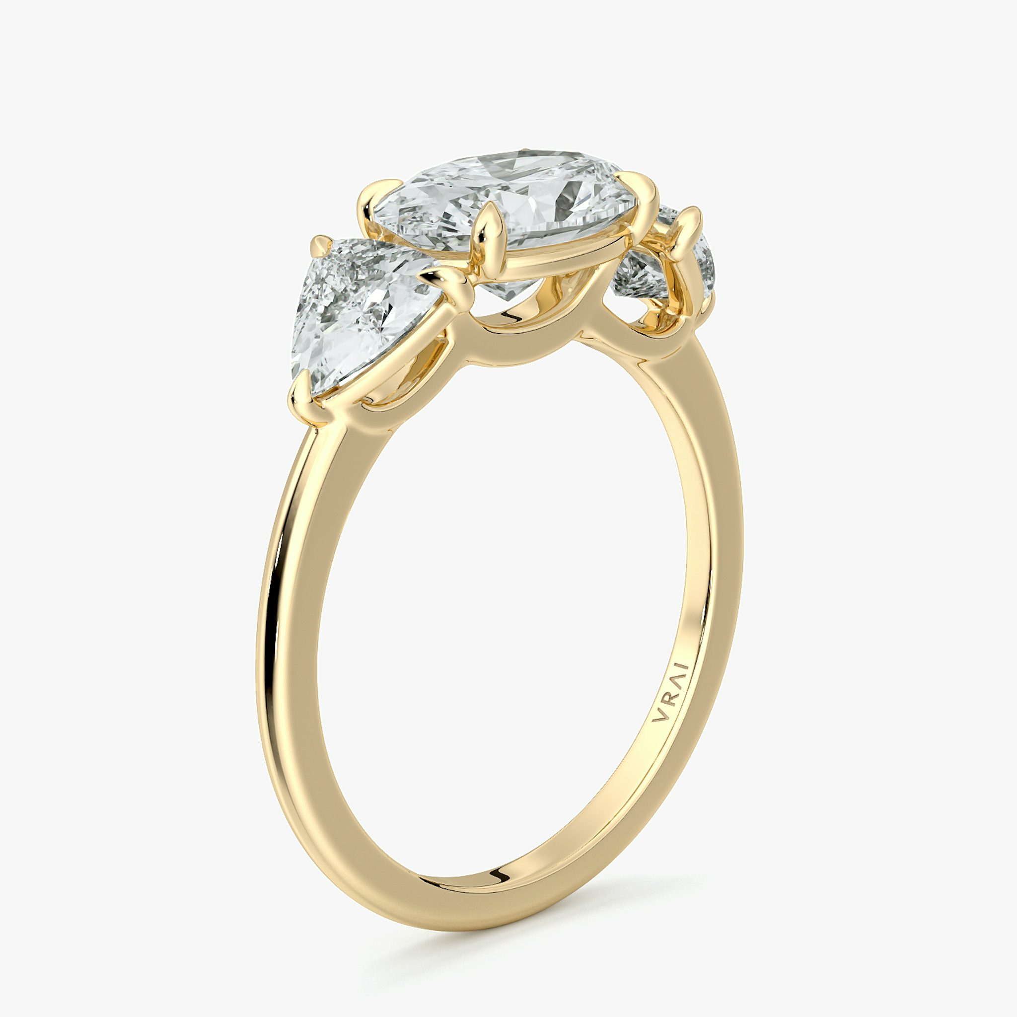 The Three Stone | Oval | 18k | Yellow Gold | bandAccent: Plain | diamondOrientation: horizontal | sideStoneCarat: 0.50ct | sideStoneShape: Trillion | caratWeight: other