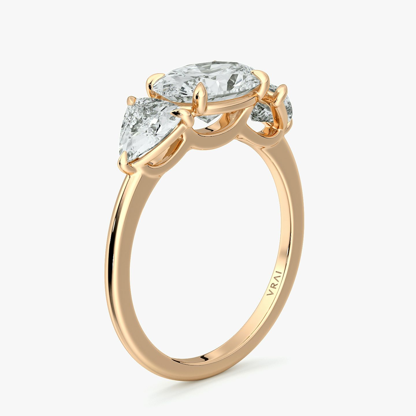 The Three Stone | Oval | 14k | Rose Gold | bandAccent: Plain | diamondOrientation: horizontal | sideStoneCarat: 0.50ct | sideStoneShape: Trillion | caratWeight: other
