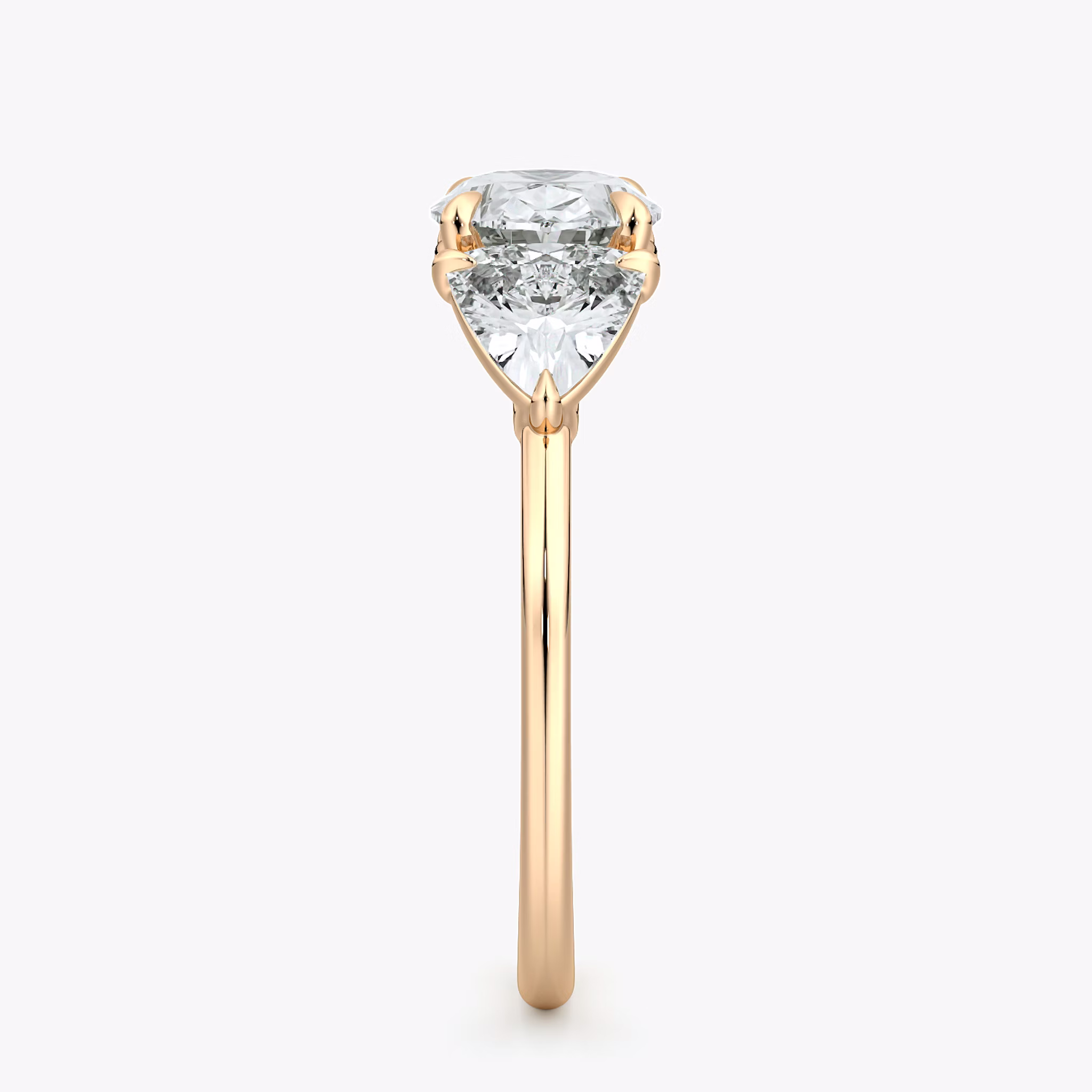 The Three Stone | Oval | 14k | Rose Gold | bandAccent: Plain | diamondOrientation: horizontal | sideStoneCarat: 0.50ct | sideStoneShape: Trillion | caratWeight: other