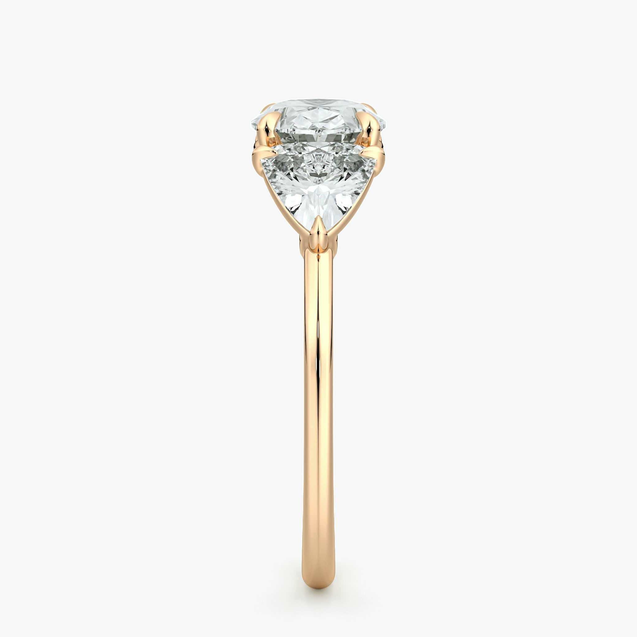 The Three Stone | Oval | 14k | Rose Gold | bandAccent: Plain | diamondOrientation: horizontal | sideStoneCarat: 0.50ct | sideStoneShape: Trillion | caratWeight: other