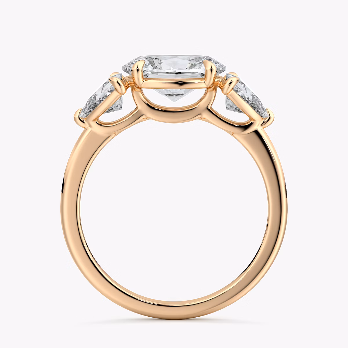 The Three Stone | Oval | 14k | Rose Gold | bandAccent: Plain | diamondOrientation: horizontal | sideStoneCarat: 0.50ct | sideStoneShape: Trillion | caratWeight: other