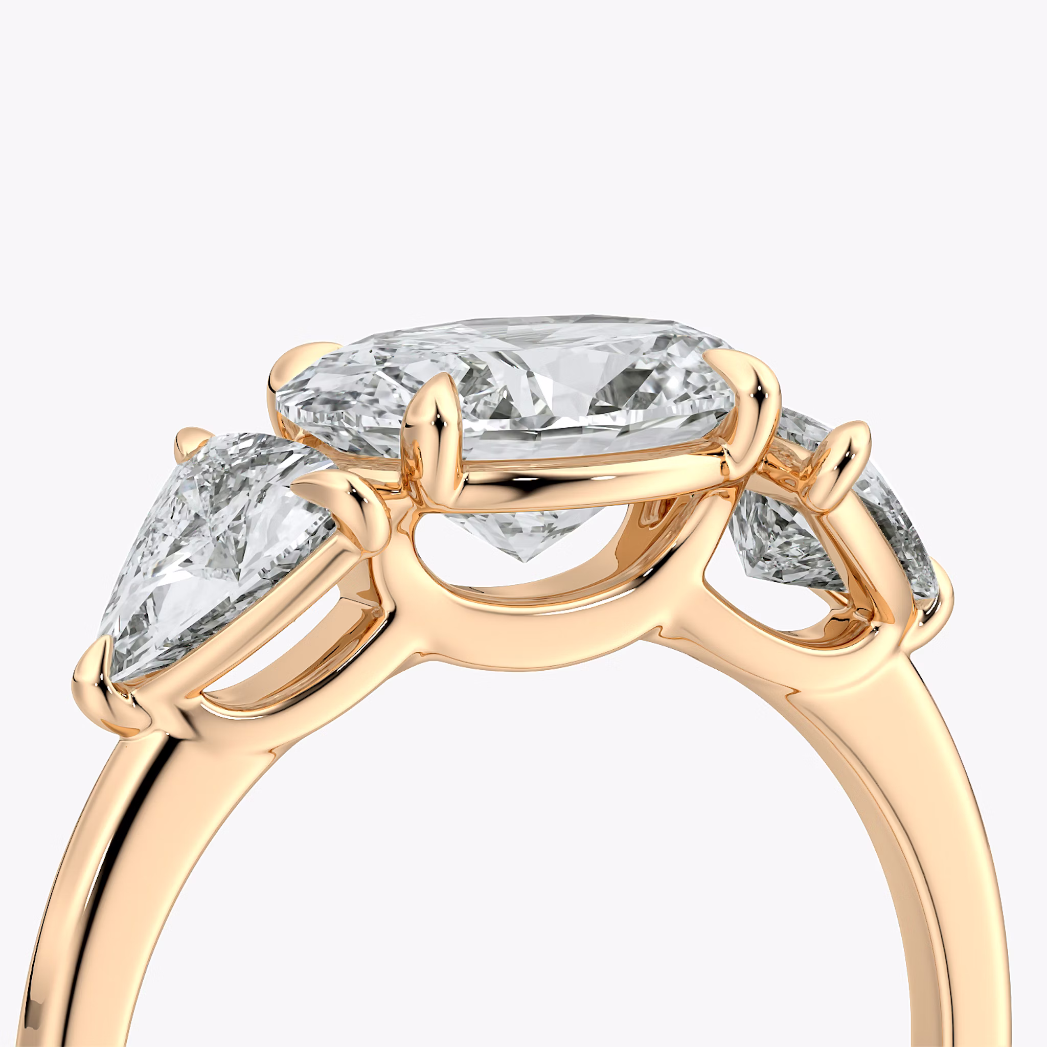 The Three Stone | Oval | 14k | Rose Gold | bandAccent: Plain | diamondOrientation: horizontal | sideStoneCarat: 0.50ct | sideStoneShape: Trillion | caratWeight: other