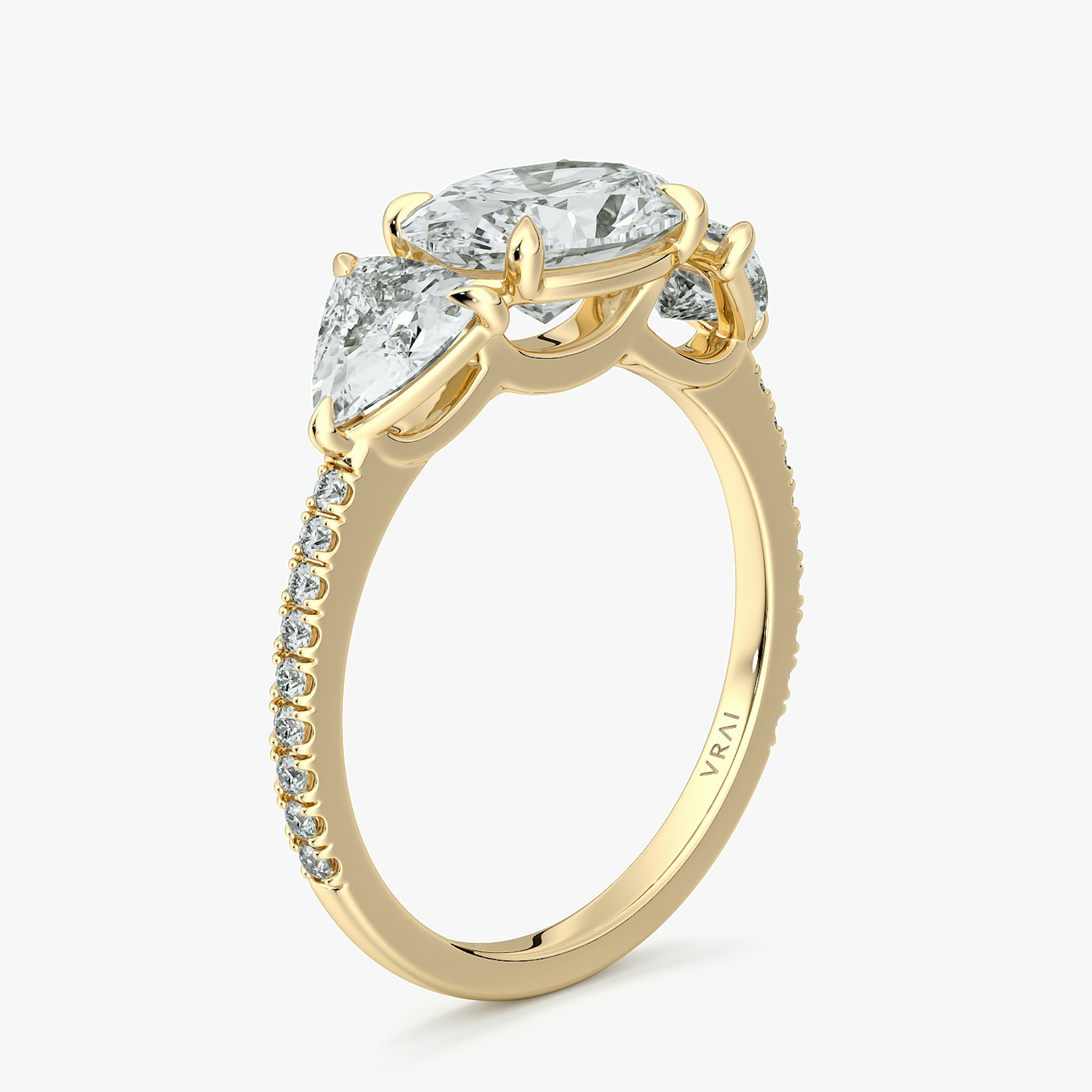 The Three Stone | Oval | 18k | Yellow Gold | bandAccent: Pavé | diamondOrientation: horizontal | sideStoneCarat: 0.50ct | sideStoneShape: Trillion | caratWeight: other