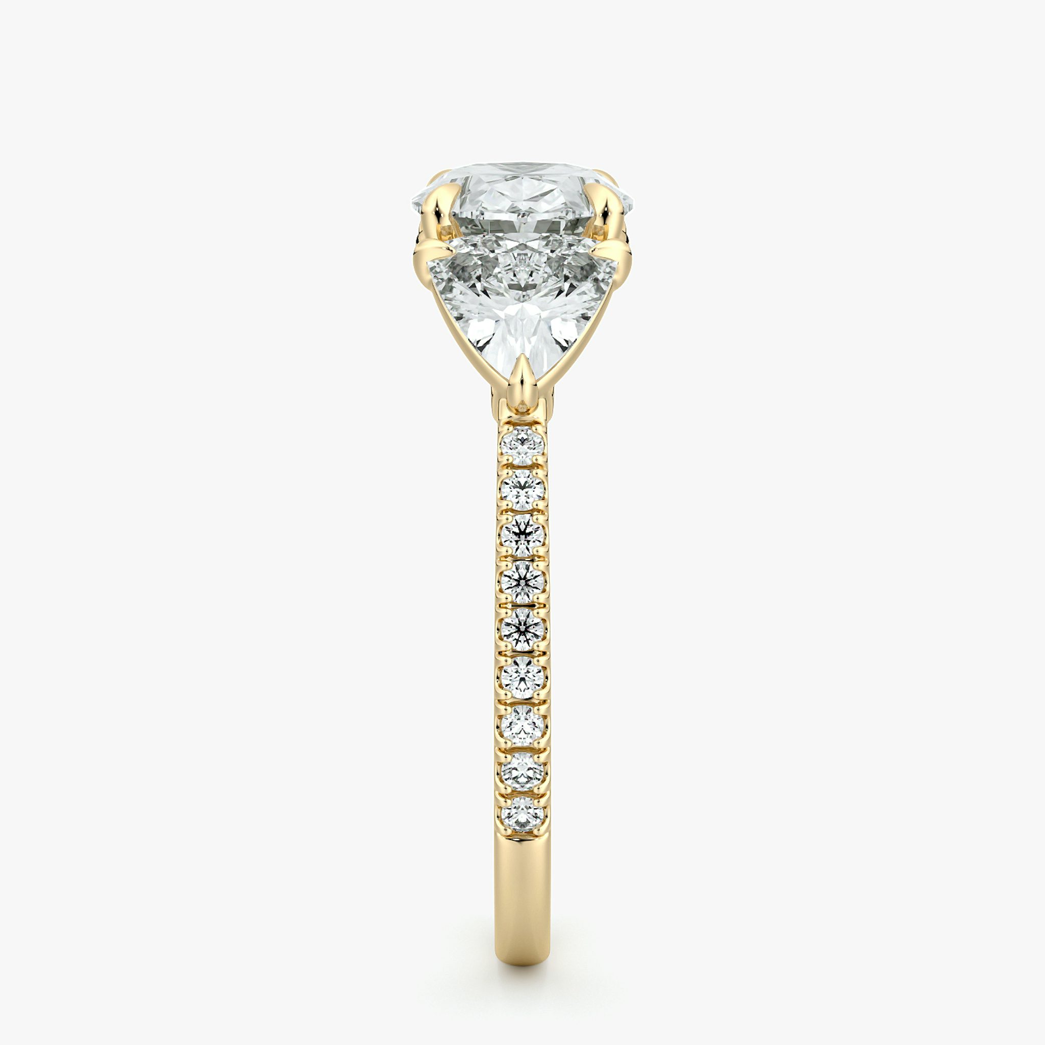 The Three Stone | Oval | 18k | Yellow Gold | bandAccent: Pavé | diamondOrientation: horizontal | sideStoneCarat: 0.50ct | sideStoneShape: Trillion | caratWeight: other