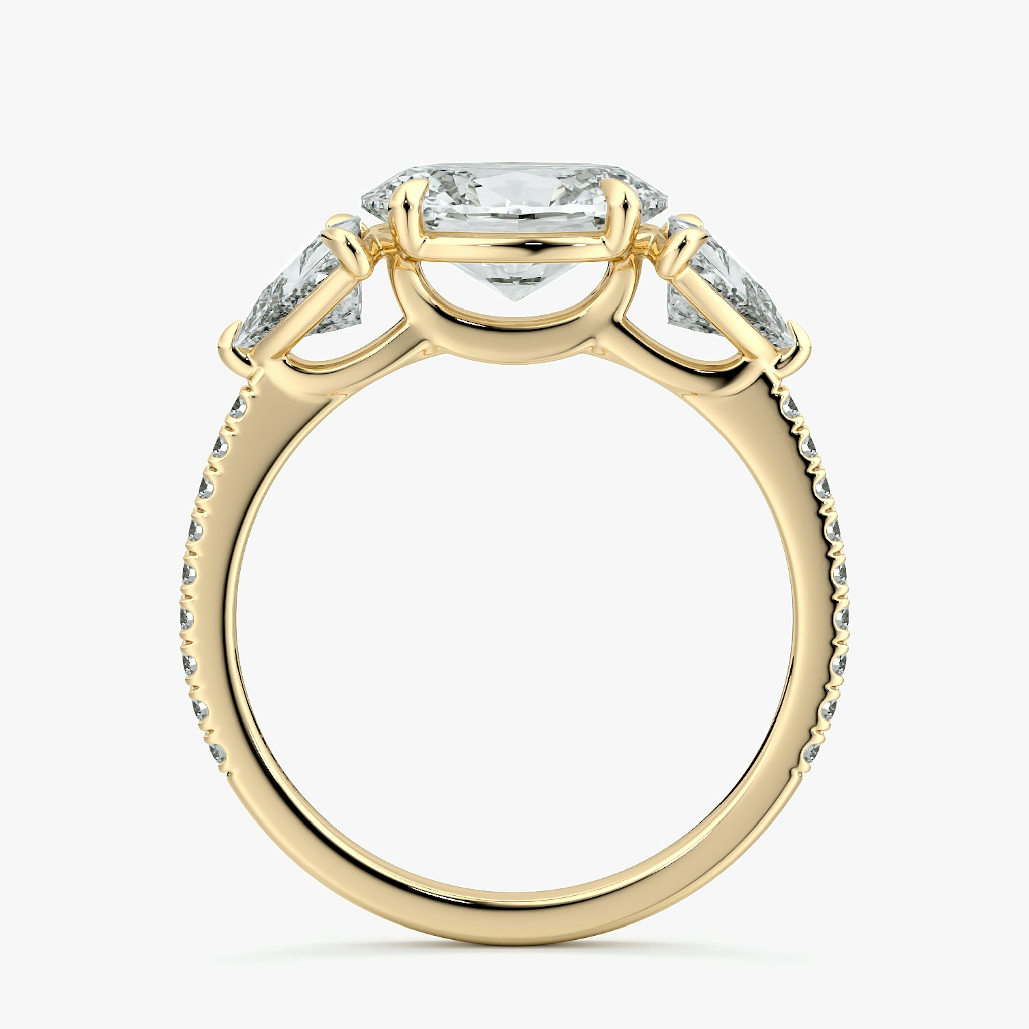 The Three Stone | Oval | 18k | Yellow Gold | bandAccent: Pavé | diamondOrientation: horizontal | sideStoneCarat: 0.50ct | sideStoneShape: Trillion | caratWeight: other