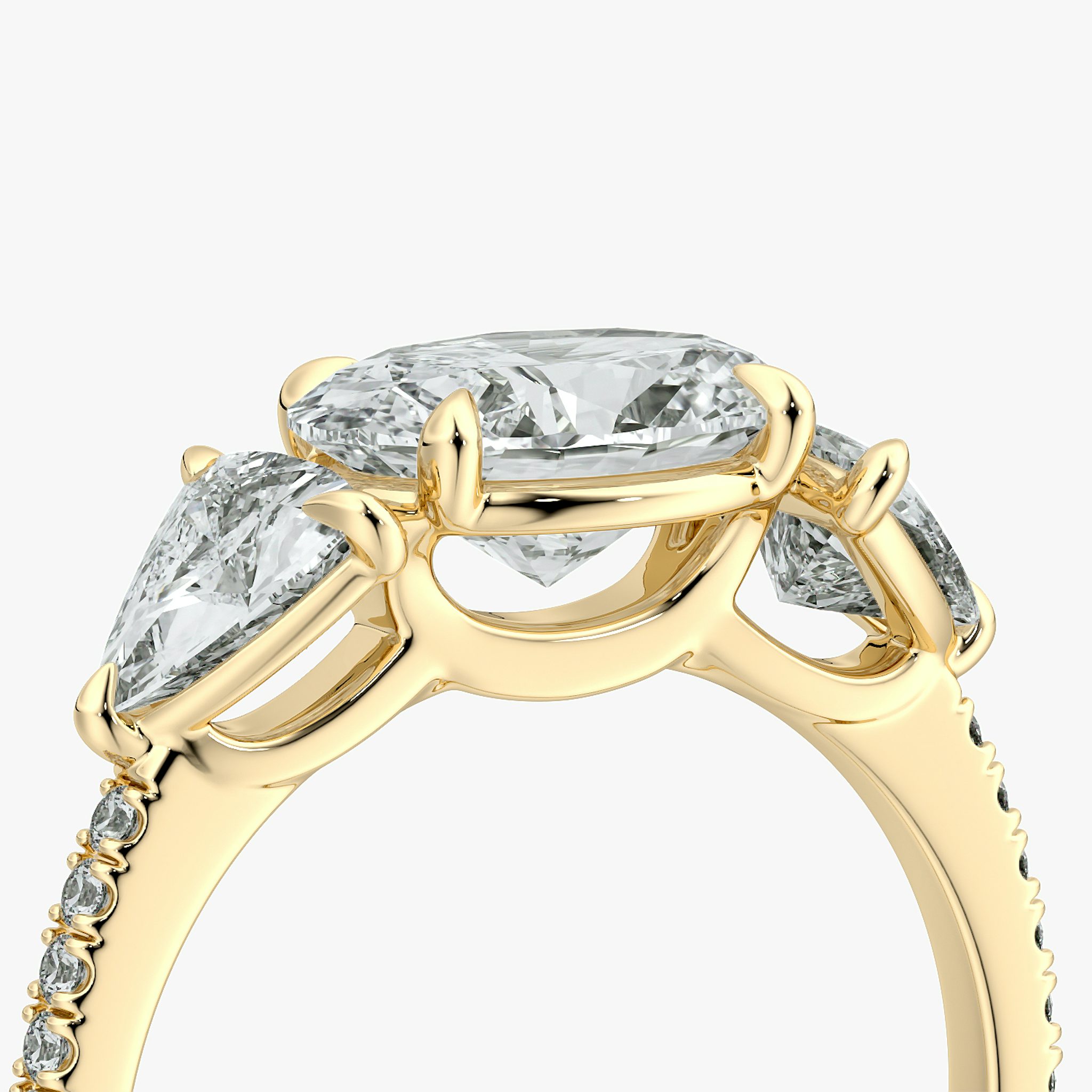 The Three Stone | Oval | 18k | Yellow Gold | bandAccent: Pavé | diamondOrientation: horizontal | sideStoneCarat: 0.50ct | sideStoneShape: Trillion | caratWeight: other