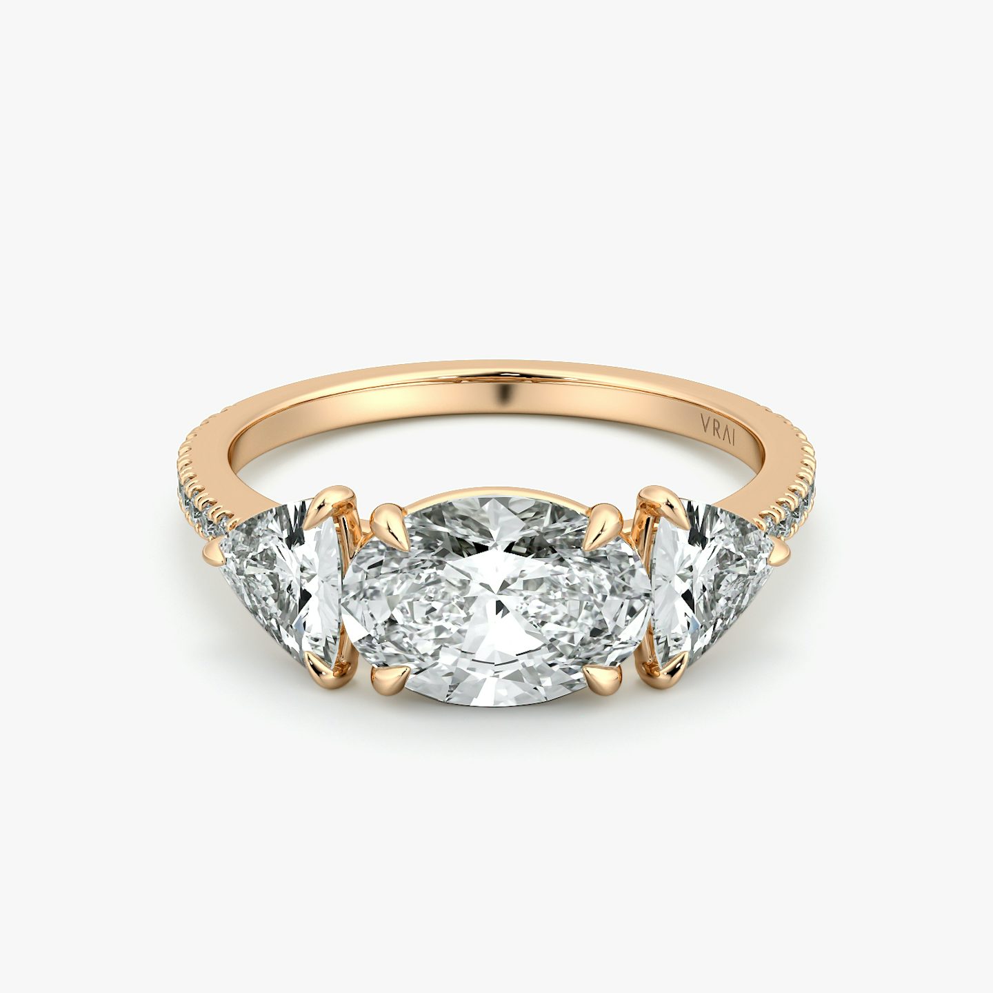 The Three Stone | Oval | 14k | Rose Gold | bandAccent: Pavé | diamondOrientation: horizontal | sideStoneCarat: 0.50ct | sideStoneShape: Trillion | caratWeight: other