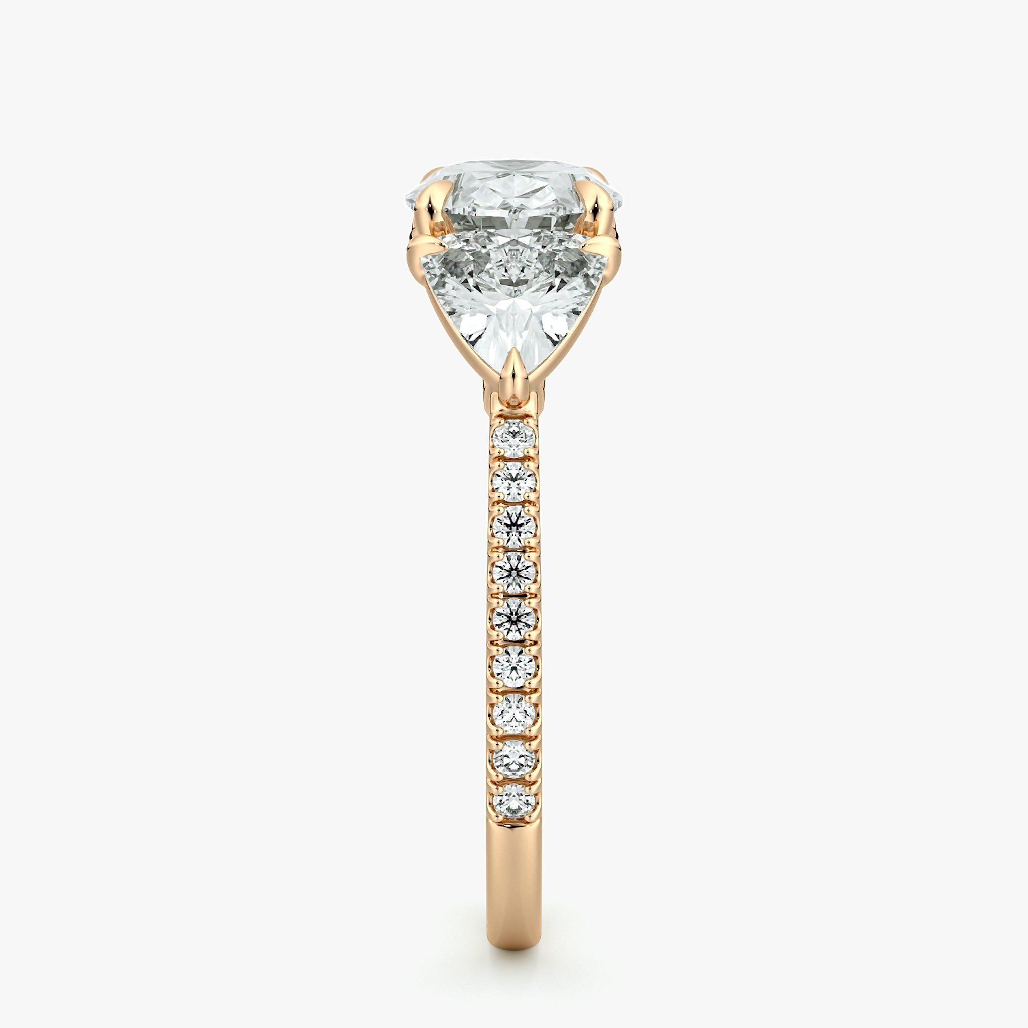 The Three Stone | Oval | 14k | Rose Gold | bandAccent: Pavé | diamondOrientation: horizontal | sideStoneCarat: 0.50ct | sideStoneShape: Trillion | caratWeight: other