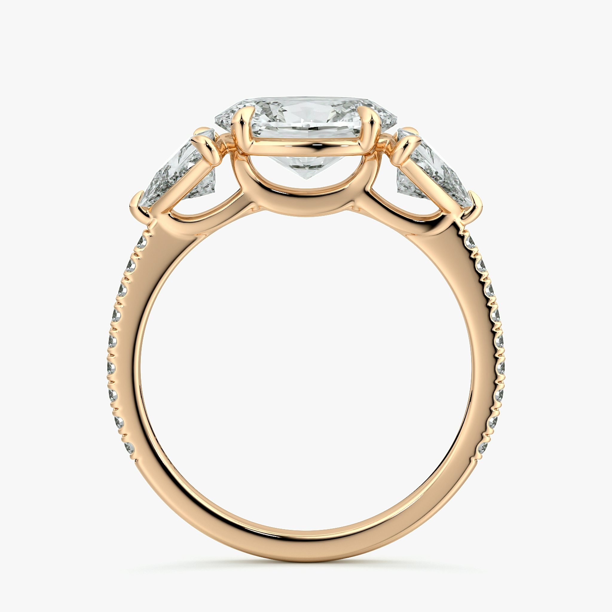 The Three Stone | Oval | 14k | Rose Gold | bandAccent: Pavé | diamondOrientation: horizontal | sideStoneCarat: 0.50ct | sideStoneShape: Trillion | caratWeight: other