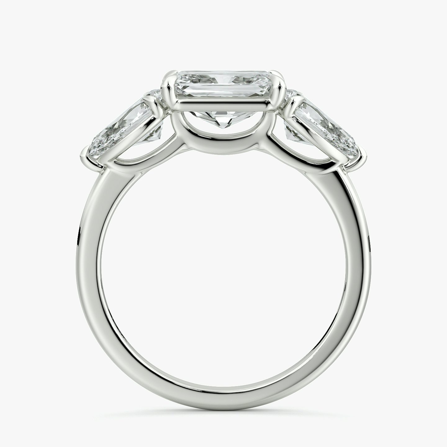 The Three Stone | Radiant | Platinum | bandAccent: Plain | diamondOrientation: horizontal | sideStoneCarat: 0.50ct | sideStoneShape: Pear | caratWeight: other