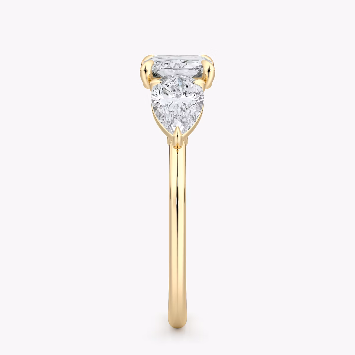 The Three Stone | Radiant | 18k | Yellow Gold | bandAccent: Plain | diamondOrientation: horizontal | sideStoneCarat: 0.50ct | sideStoneShape: Pear | caratWeight: other