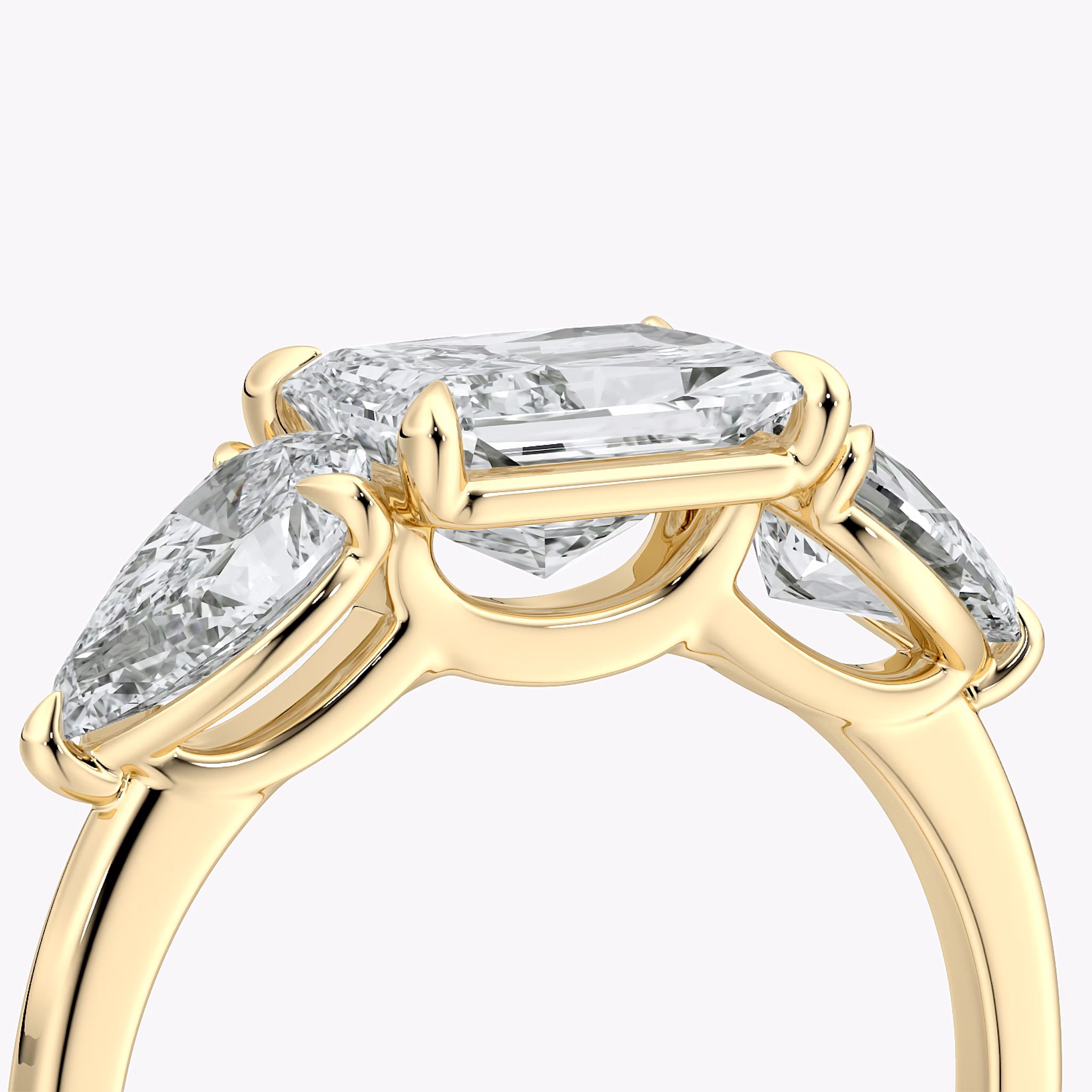 The Three Stone | Radiant | 18k | Yellow Gold | bandAccent: Plain | diamondOrientation: horizontal | sideStoneCarat: 0.50ct | sideStoneShape: Pear | caratWeight: other