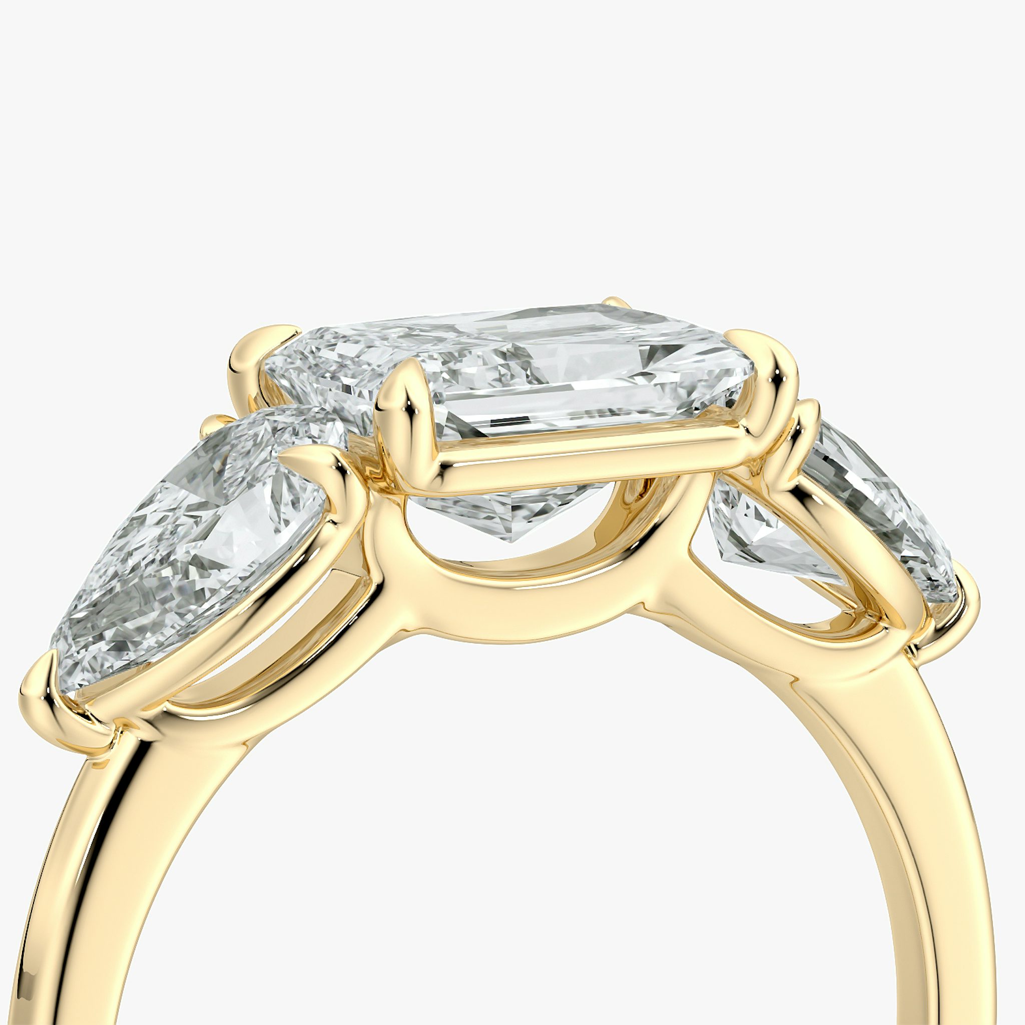 The Three Stone | Radiant | 18k | Yellow Gold | bandAccent: Plain | diamondOrientation: horizontal | sideStoneCarat: 0.50ct | sideStoneShape: Pear | caratWeight: other