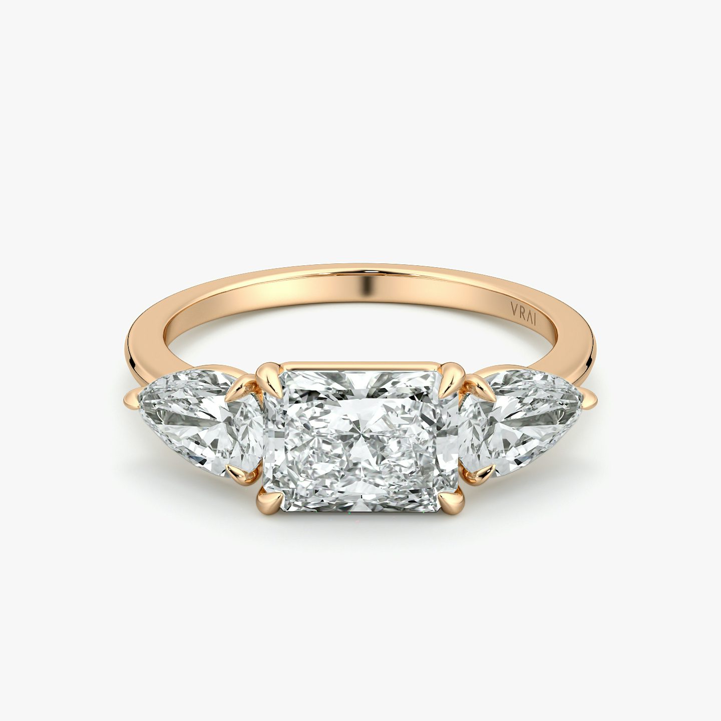 The Three Stone | Radiant | 14k | Rose Gold | bandAccent: Plain | diamondOrientation: horizontal | sideStoneCarat: 0.50ct | sideStoneShape: Pear | caratWeight: other