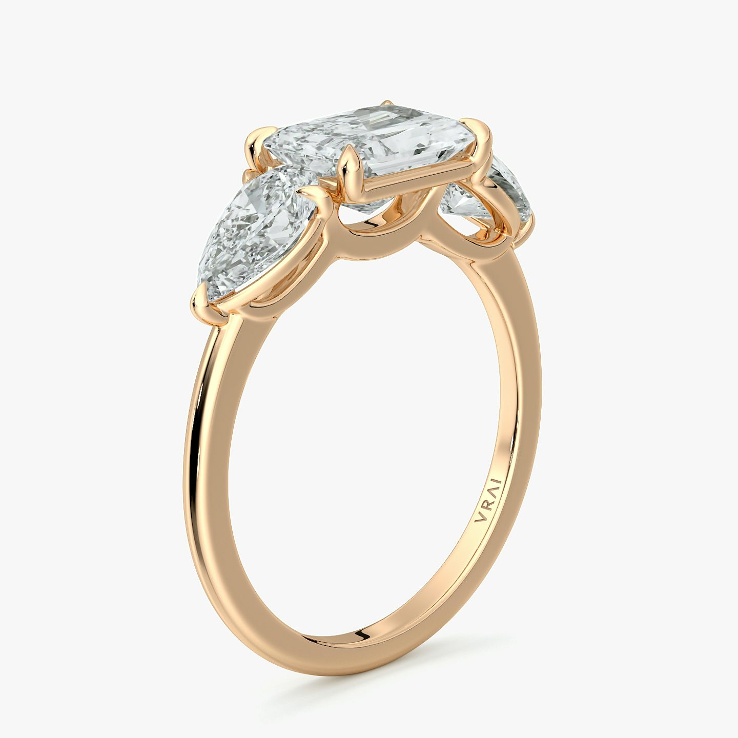 The Three Stone | Radiant | 14k | Rose Gold | bandAccent: Plain | diamondOrientation: horizontal | sideStoneCarat: 0.50ct | sideStoneShape: Pear | caratWeight: other
