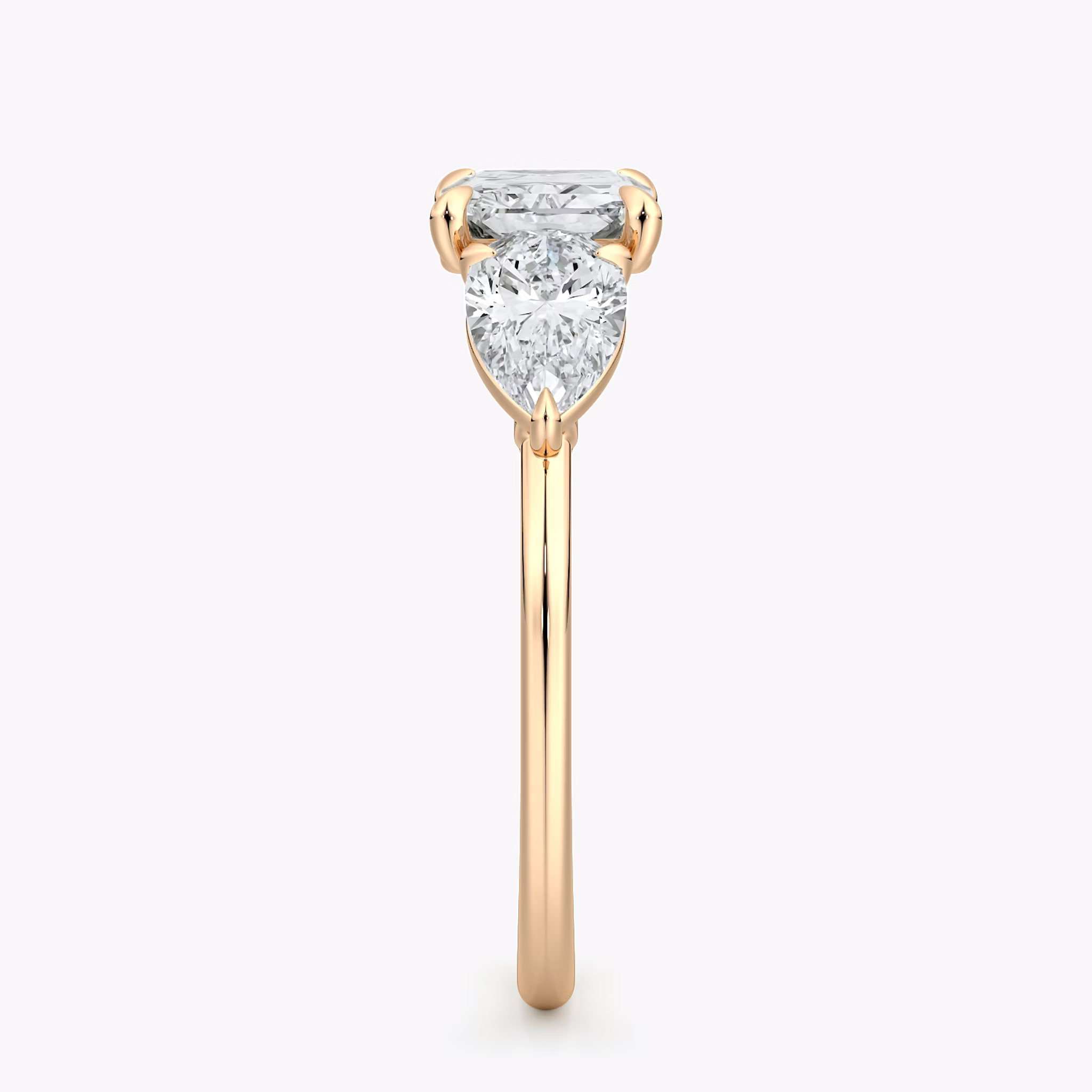 The Three Stone | Radiant | 14k | Rose Gold | bandAccent: Plain | diamondOrientation: horizontal | sideStoneCarat: 0.50ct | sideStoneShape: Pear | caratWeight: other