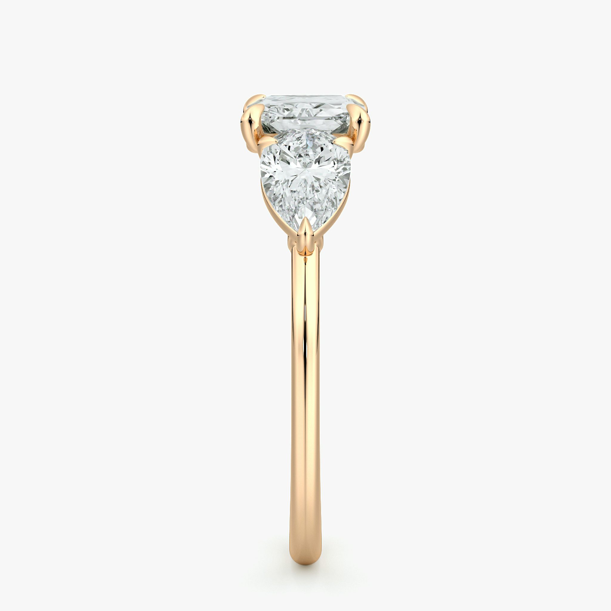 The Three Stone | Radiant | 14k | Rose Gold | bandAccent: Plain | diamondOrientation: horizontal | sideStoneCarat: 0.50ct | sideStoneShape: Pear | caratWeight: other